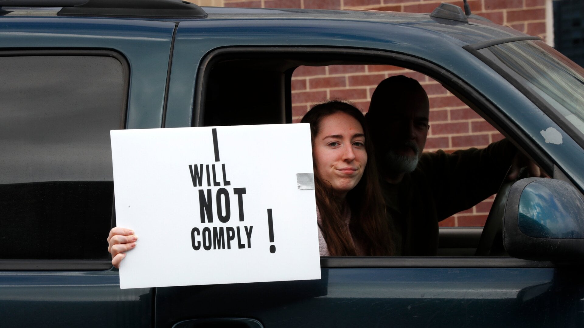 One of the protesters who ensnarled traffic outside the Michigan state house on April 15.