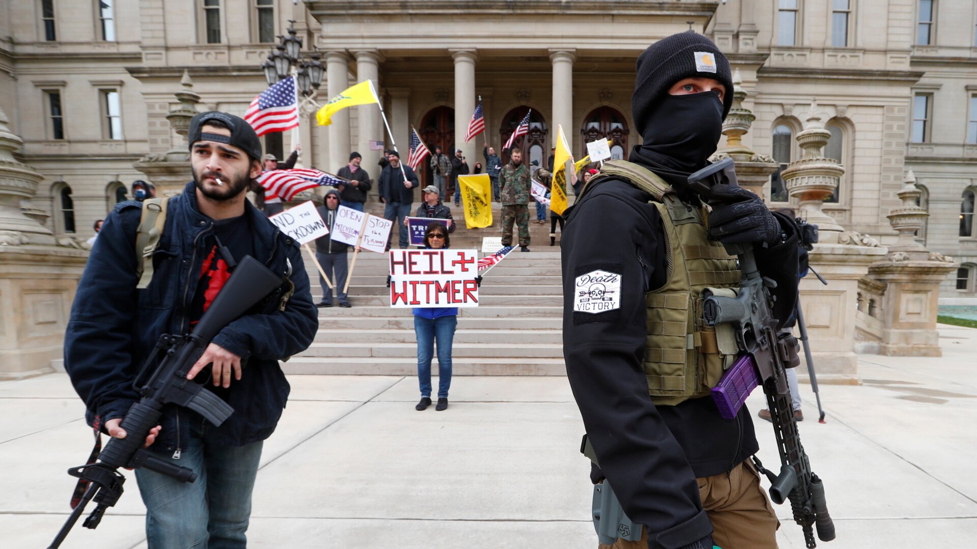 Armed protesters outside the statehouse in Michigan on April 15, 2020.