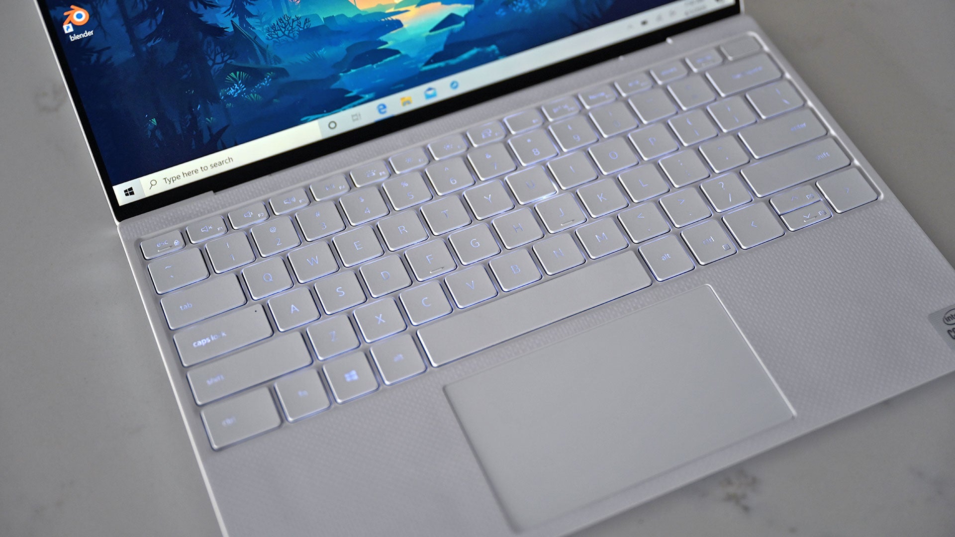 The XPS 13's backlighting could be better, but one interesting thing about the white model is that you can feel the weave of the fiberglass on the laptops deck, which is something that doesn’t happen if you go for the black carbon fiber version.