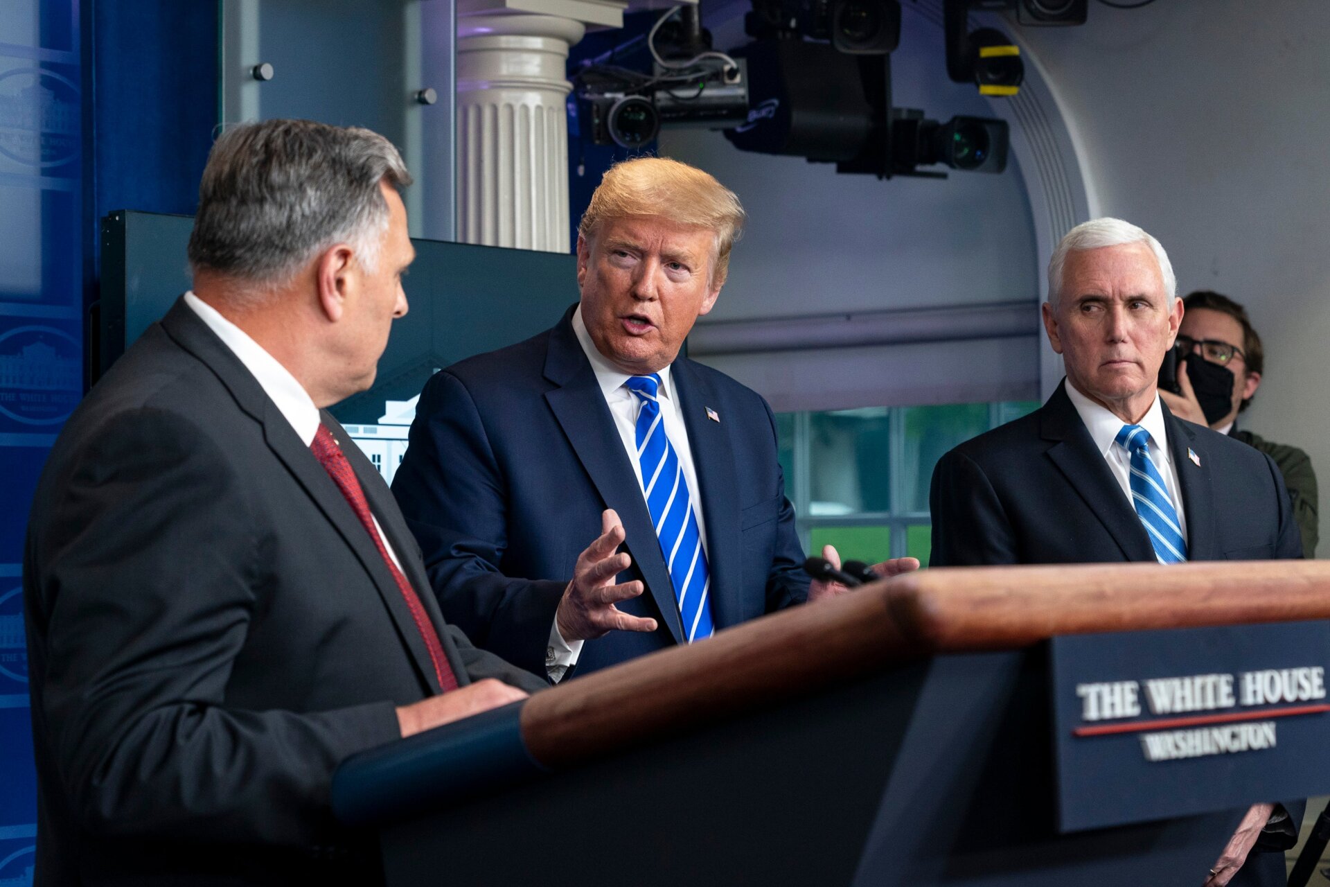 President Donald J. Trump, Vice President Mike Pence (right), and William N. Bryan, science and technology advisor to the DHS Secretary, (left), at the White House on April 23, 2020.
