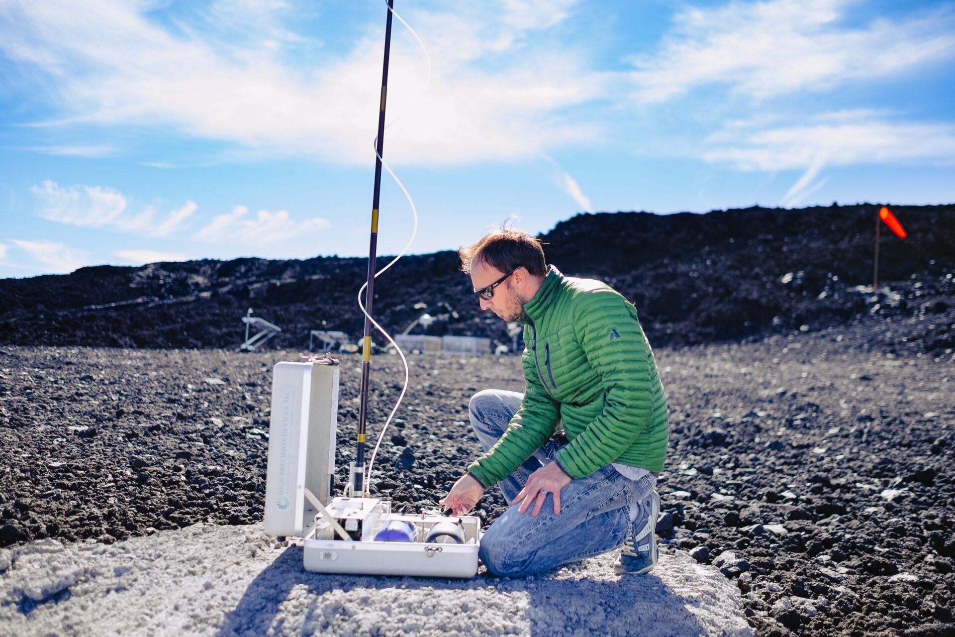 Aidan Colton takes a morning sample at Mauna Loa Observatory.