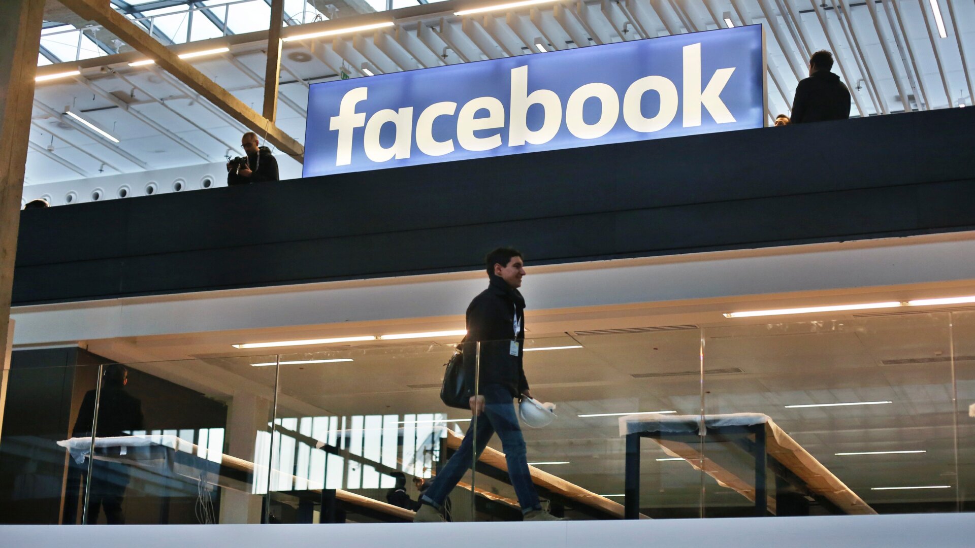 A Facebook logo on Station F in Paris, 2017.