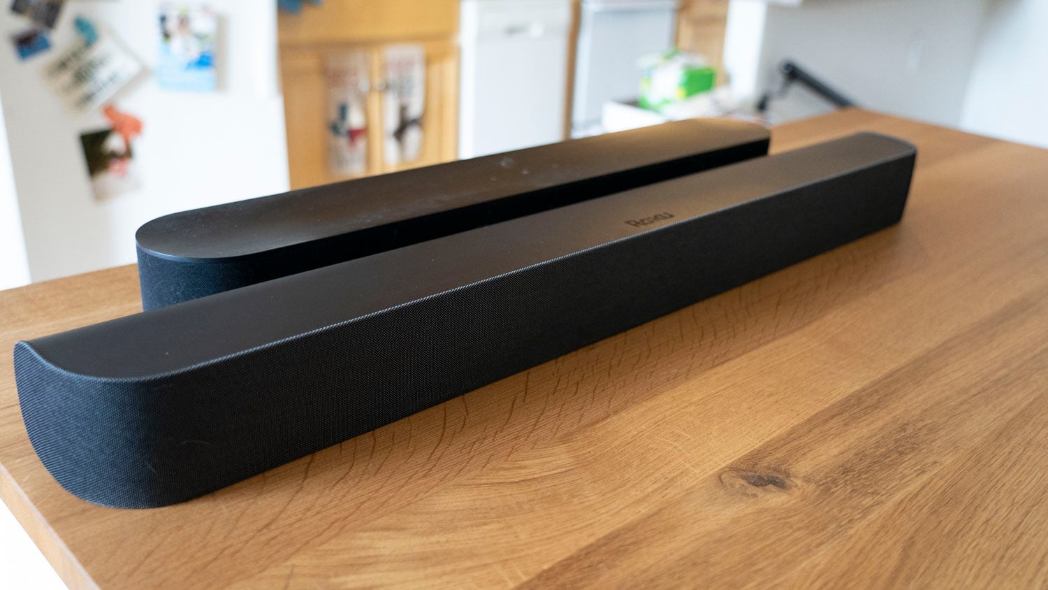 The Sonos Beam (top) is smaller, but pricier with a cleaner sound than the Roku Sound Bar (bottom.)