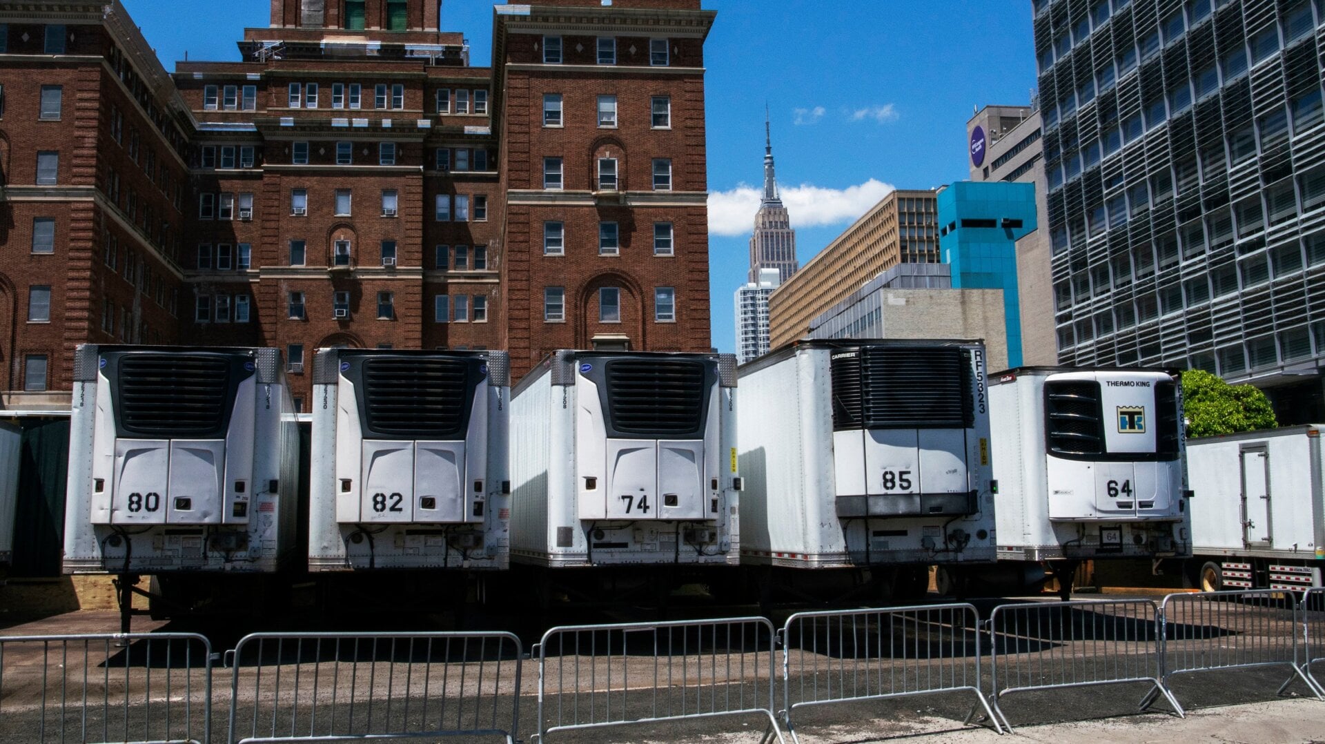 Trucks used as temporary morgues are seen outside the New York City Chief Medical Examiner’s office on May 12, 2020 in New York City.