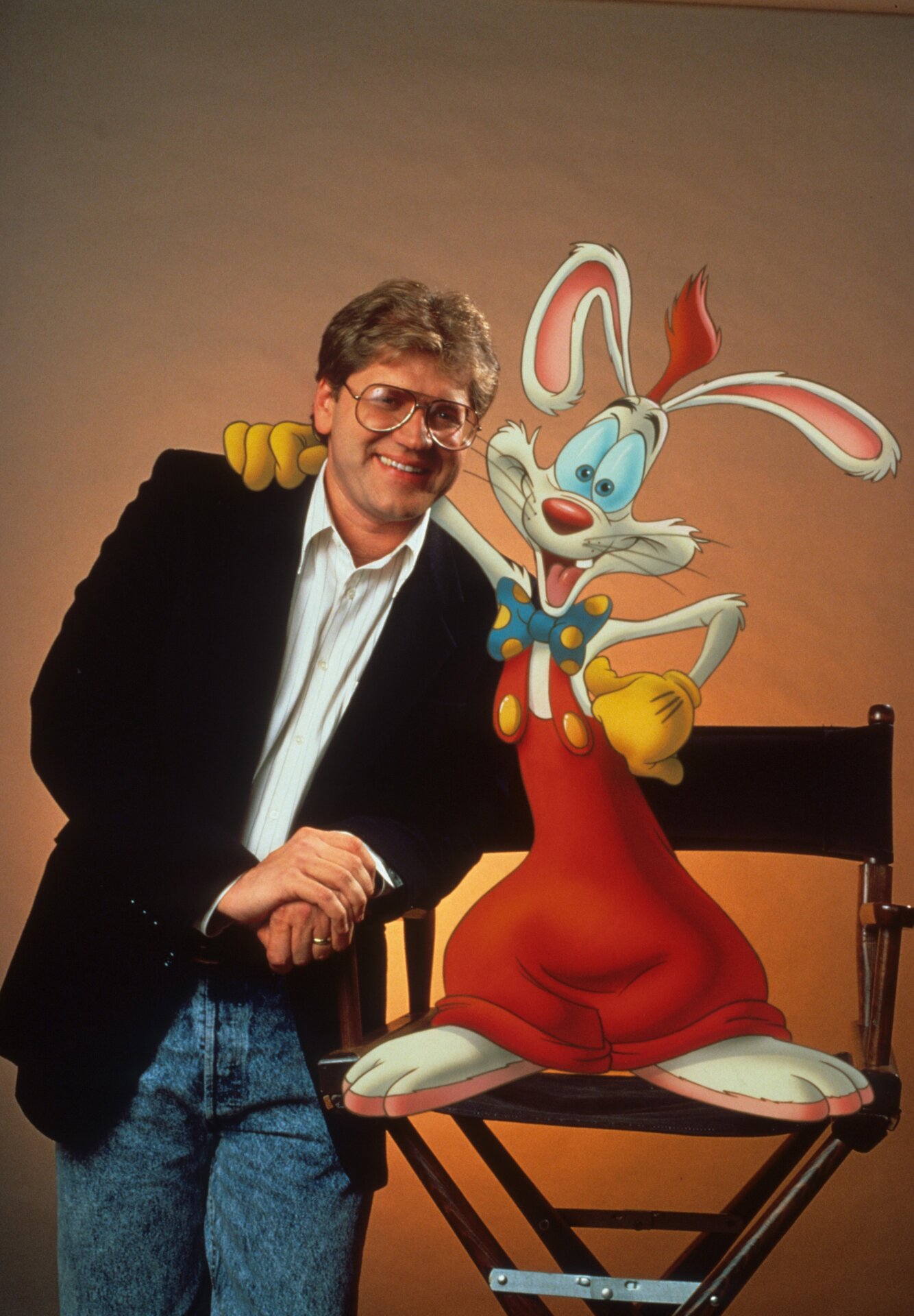 Robert Zemeckis poses with Roger Rabbit in a publicity portrait.