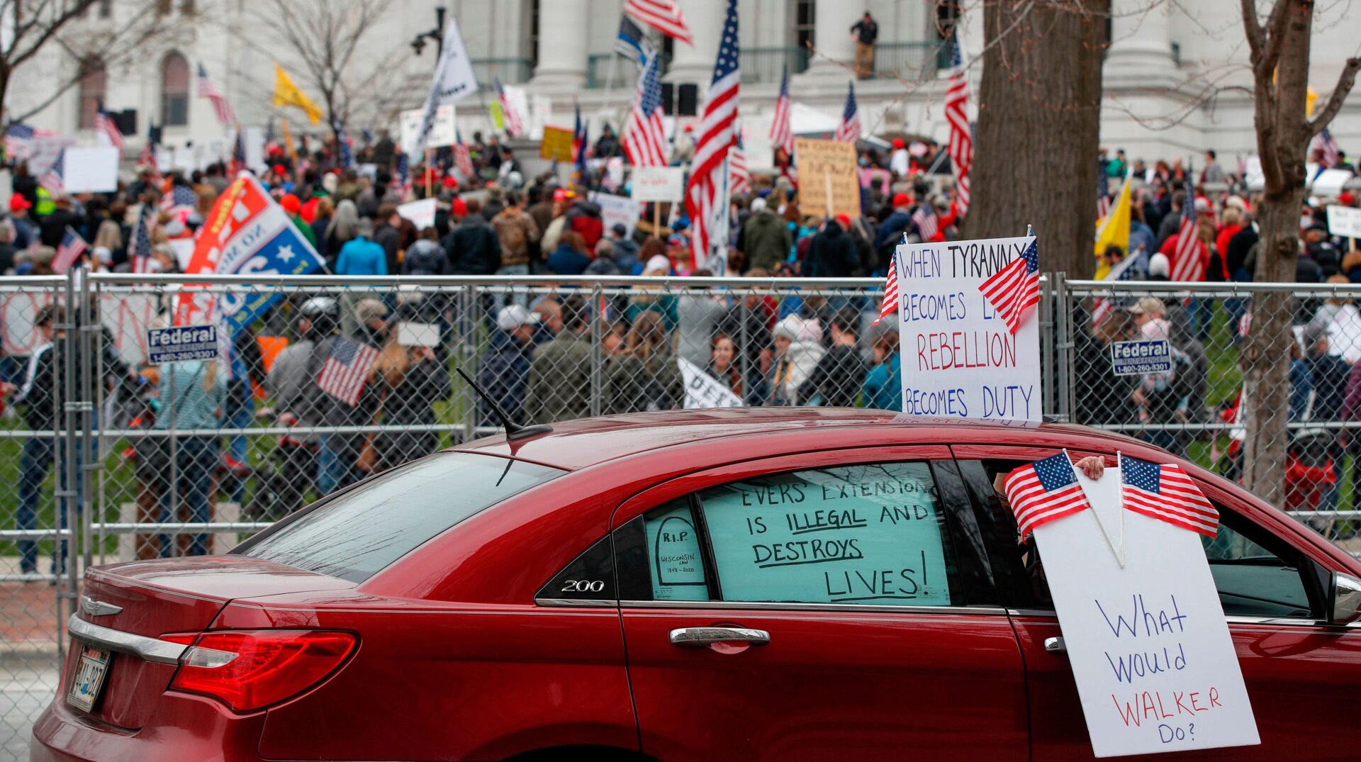 Protestors outside the Wisconsin State Capitol building in Madison on April 24, 2020.