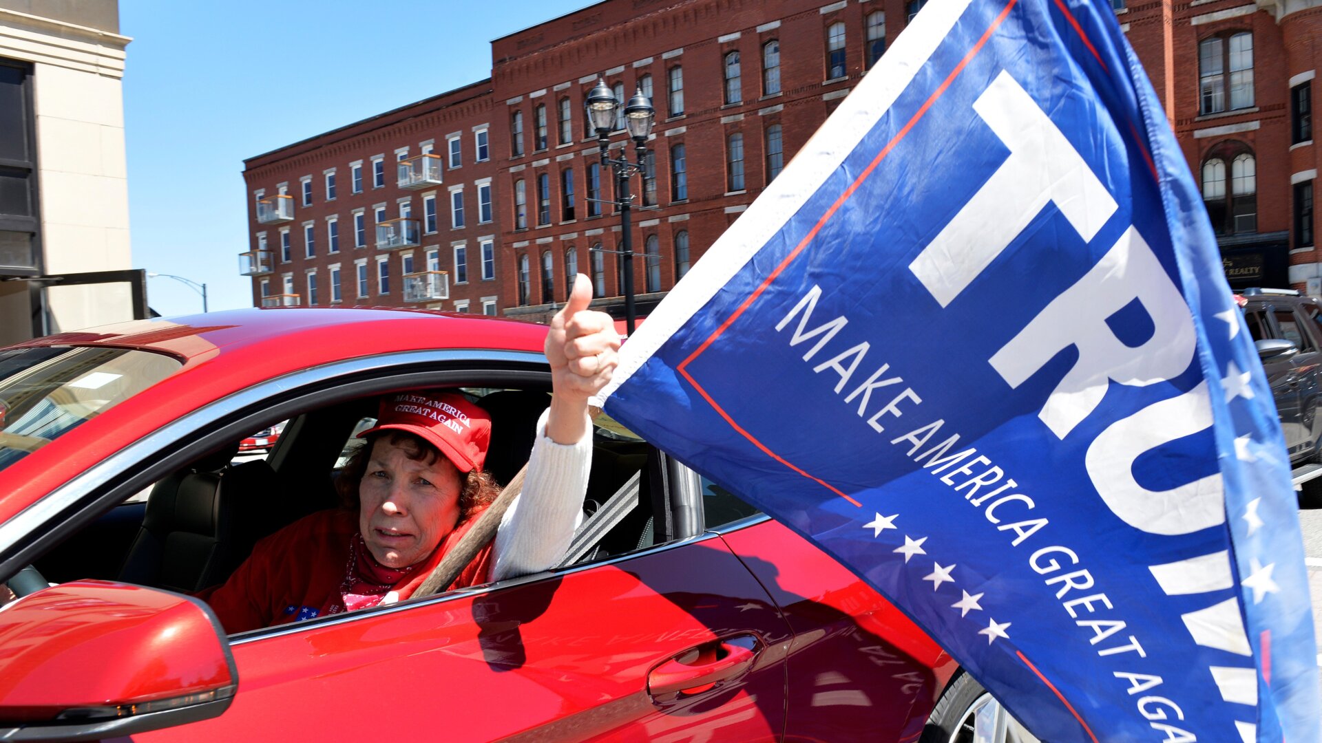 Protesters rally outside the New Hampshire State House calling for Governor Chris Sununu to open the state, in Concord on May 2, 2020.