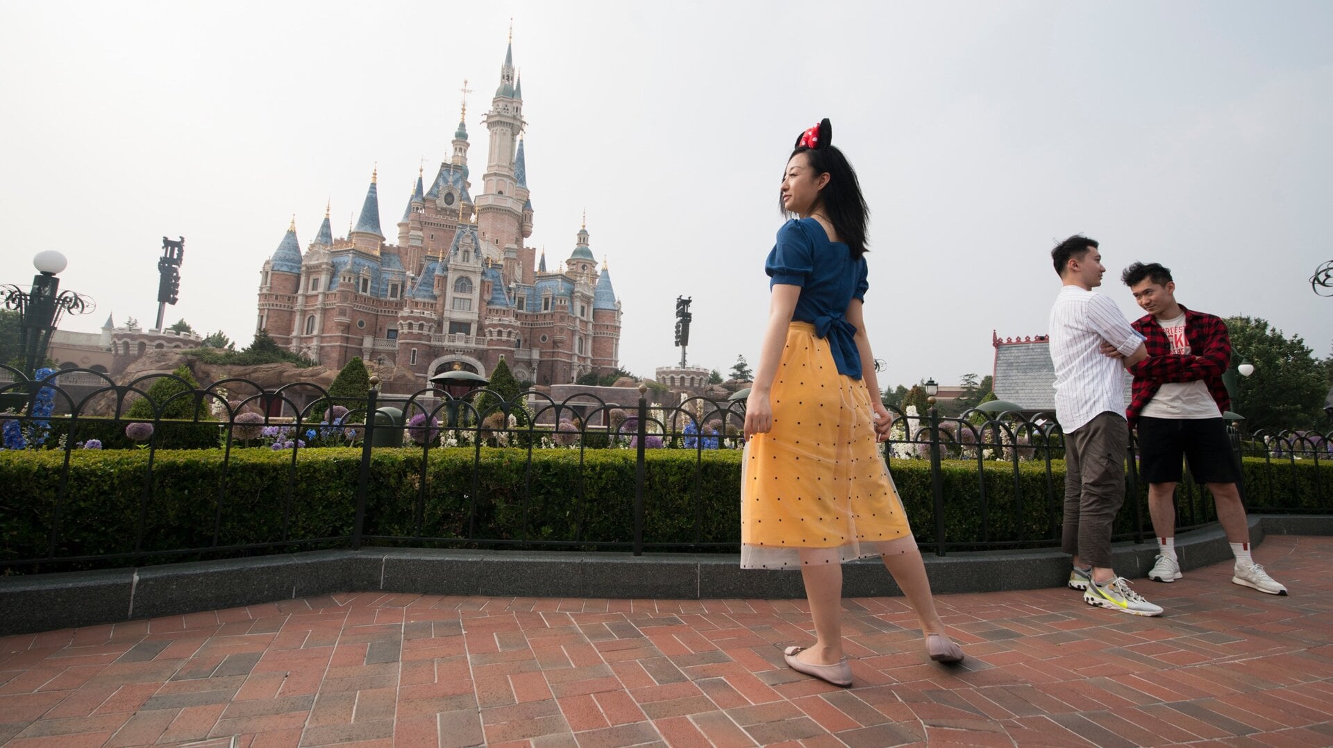 Tourists visit Shanghai Disneyland during its reopening on May 11, 2020 in Shanghai, China.