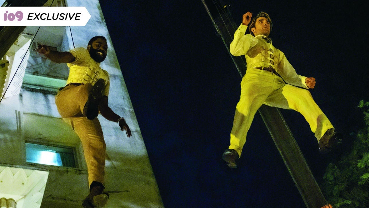 John David Washington and Robert Pattinson, on harnesses, from the Secrets of Tenet book.