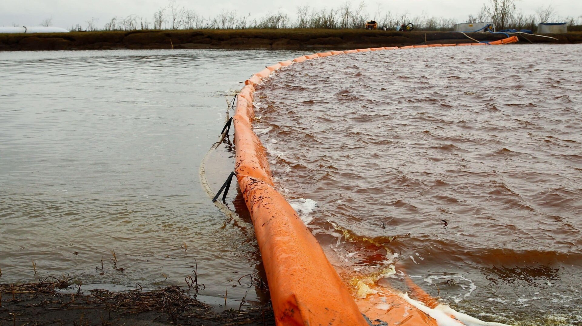 A containment boom on the Ambarnaya river.