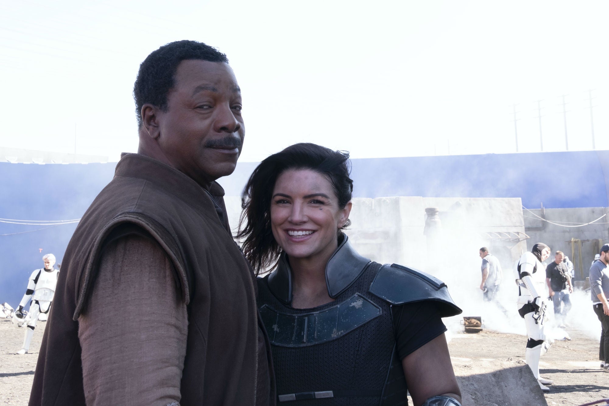 Weathers and Carano on set.