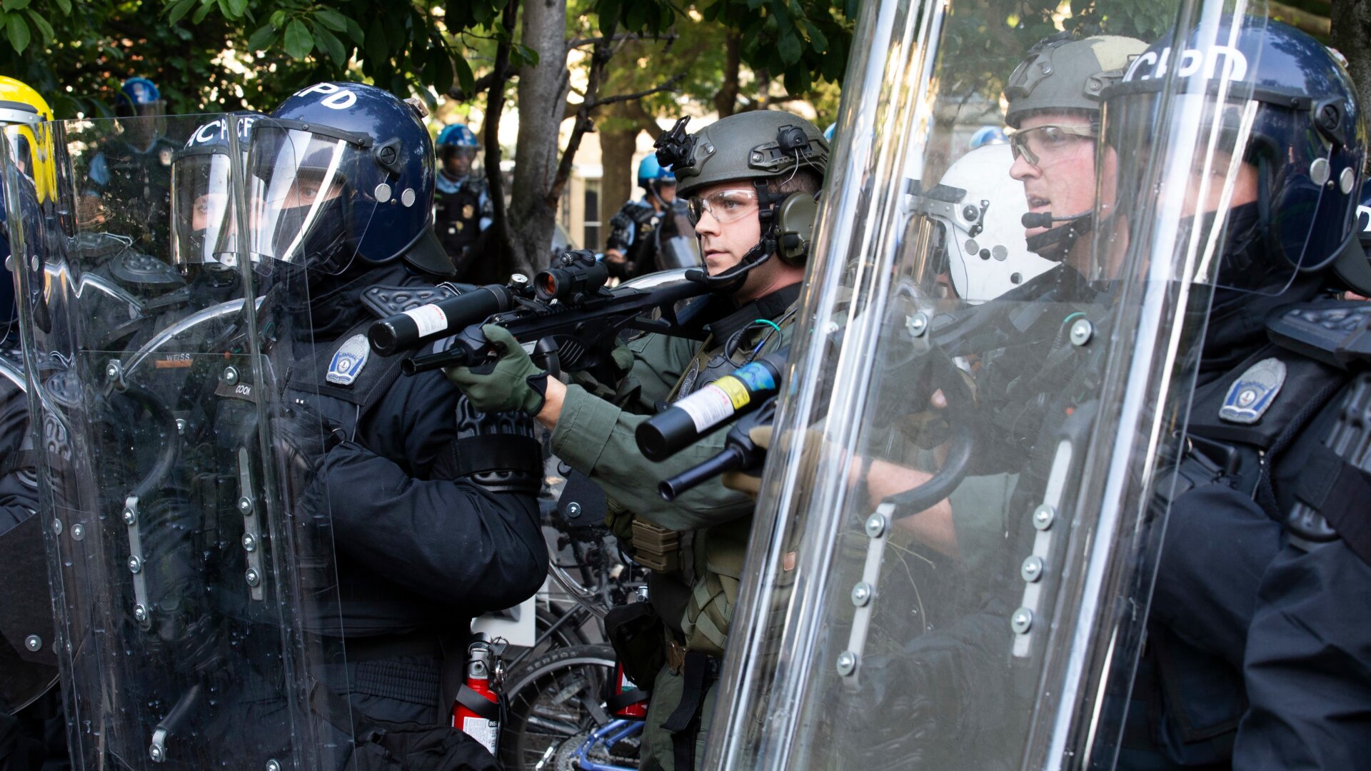 Riot police fire rubber bullets on protesters outside the White House on June 1, 2020.