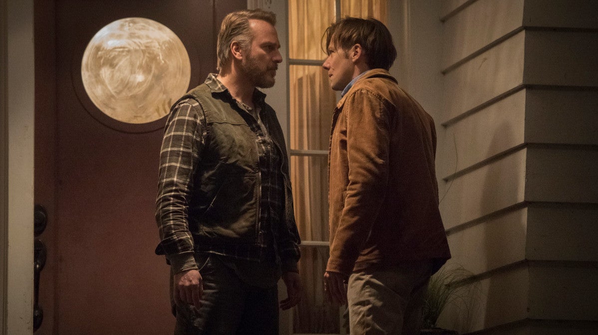 Two men (Mike Dopud and Jimmi Simpson) meet on a porch in “Meet in the Middle.”