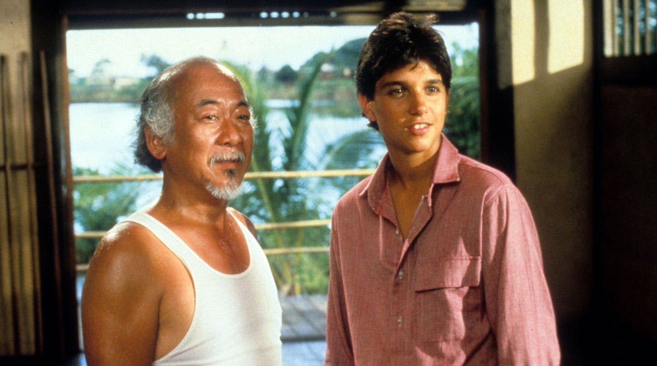 Mr. Miyagi (Pat Morita) and Daniel (Macchio) in The Karate Kid Part II.
