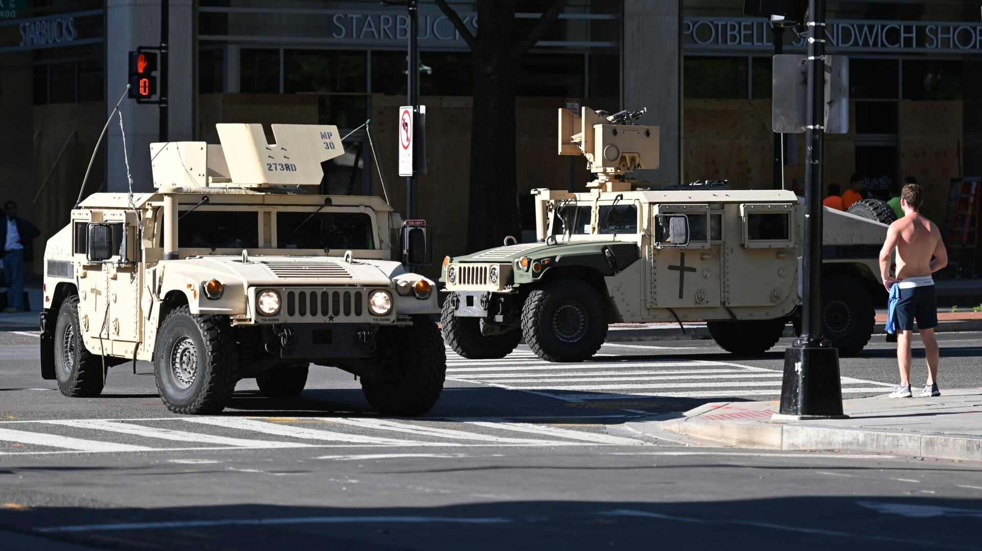 Military trucks deploy throughout downtown DC on June 1, 2020.
