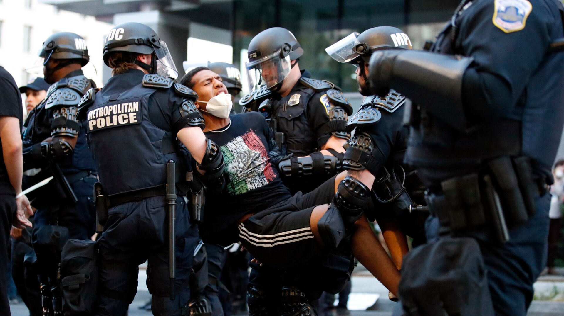 A demonstrator being taken into custody by police near the White House on June 1, 2020.