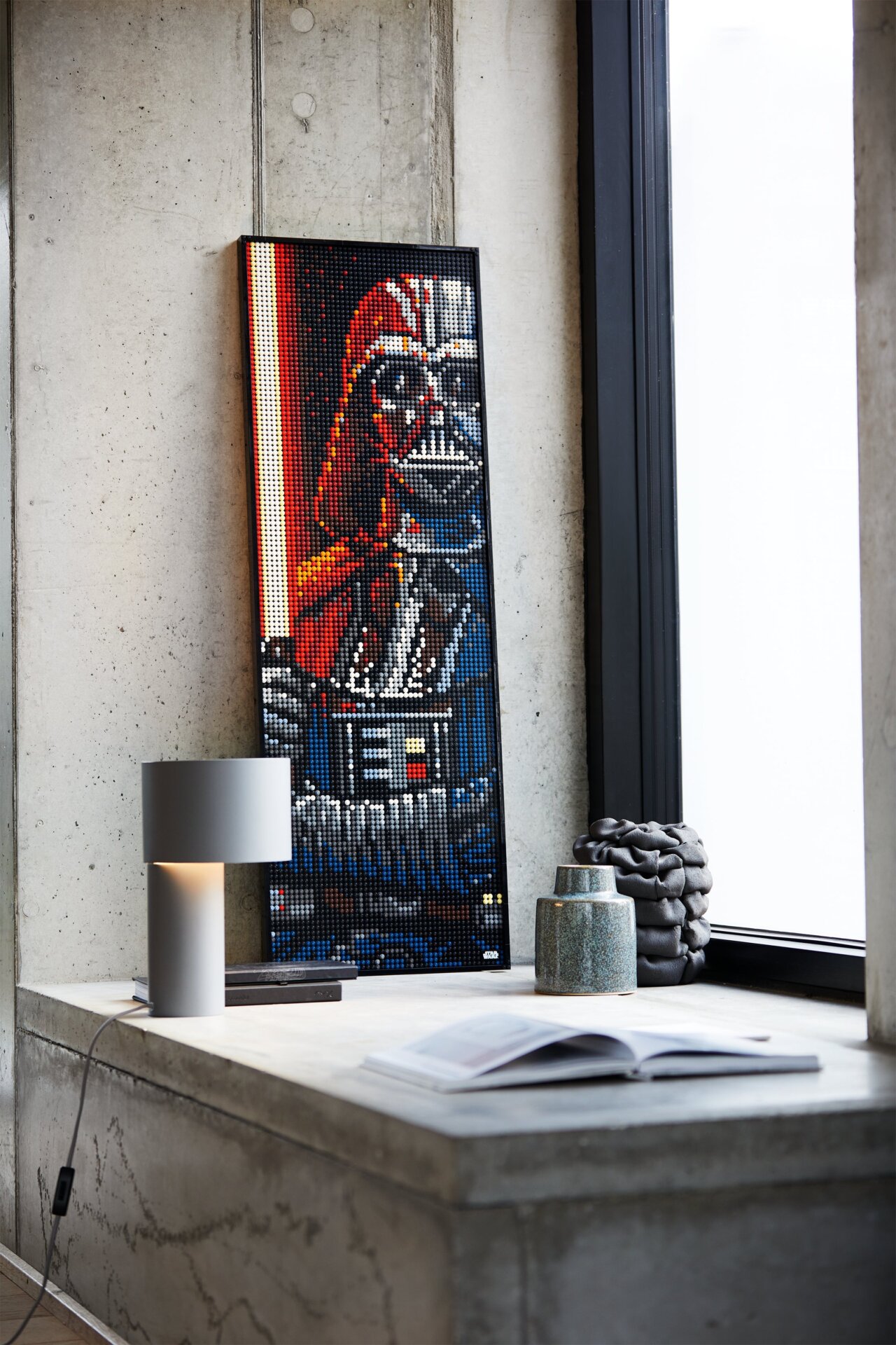 I like the idea Lego has that apparently the people willing to spend hundreds of dollars and multiple hours painstakingly building these giant art pieces out of tiny studs are then just going to...haphazardly balance them against a wall?