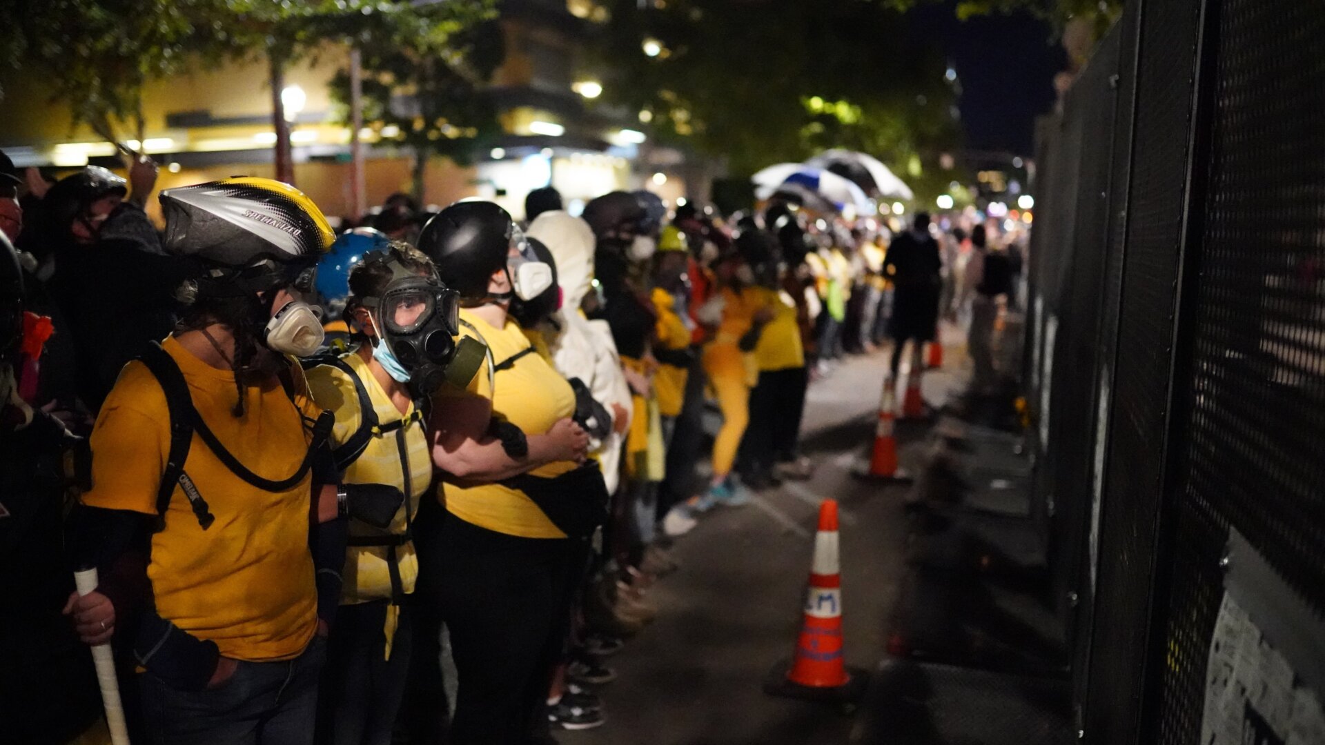 The Wall of Moms, a group of non-violent protesters, forms a human chain around the main crowd in of front of the Mark O. Hatfield U.S. Courthouse on July 23, 2020 in Portland, Oregon.