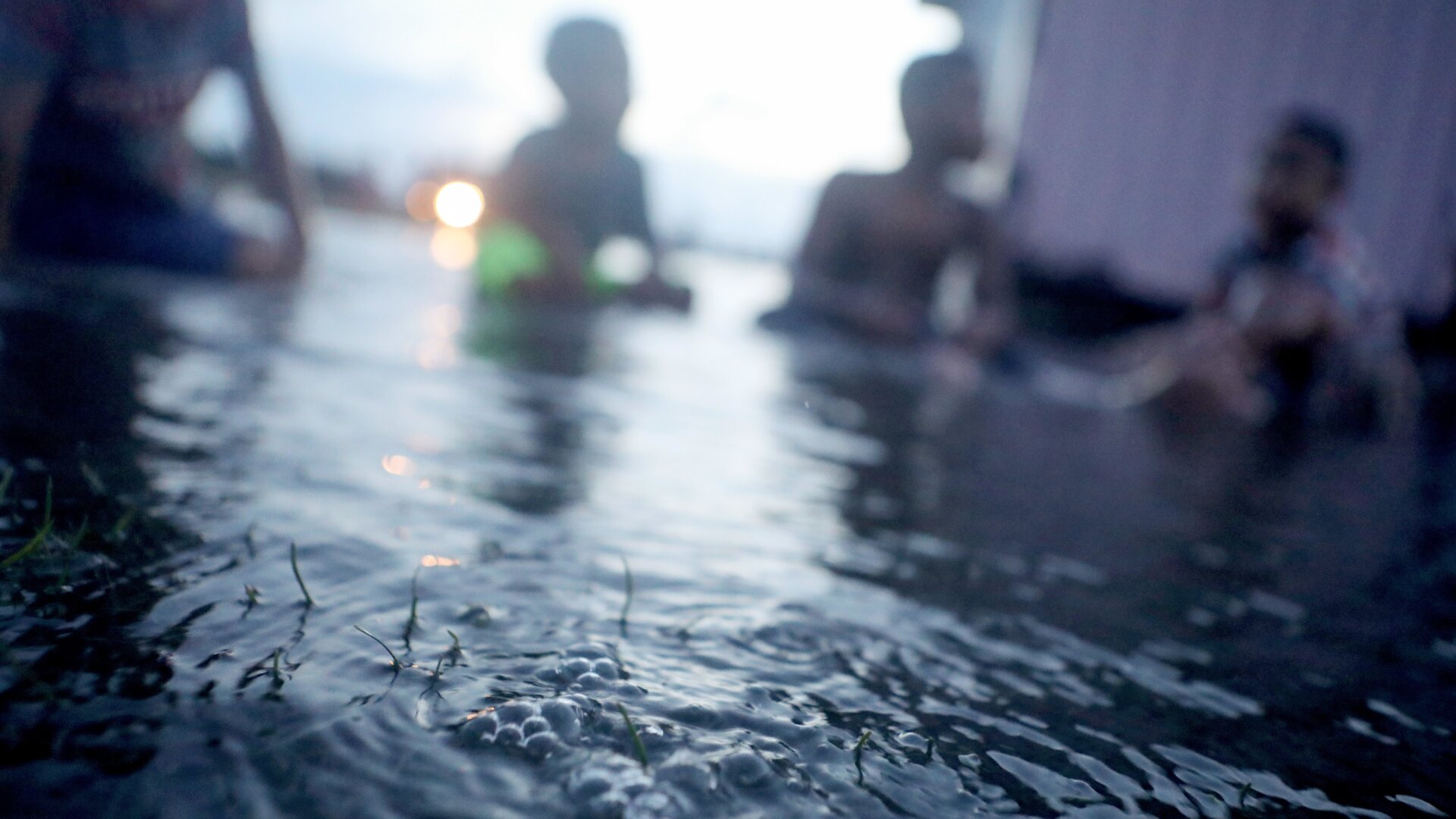 Floodwaters occur near high tide in a low-lying area in Funafuti, Tuvalu, on November 27, 2019.