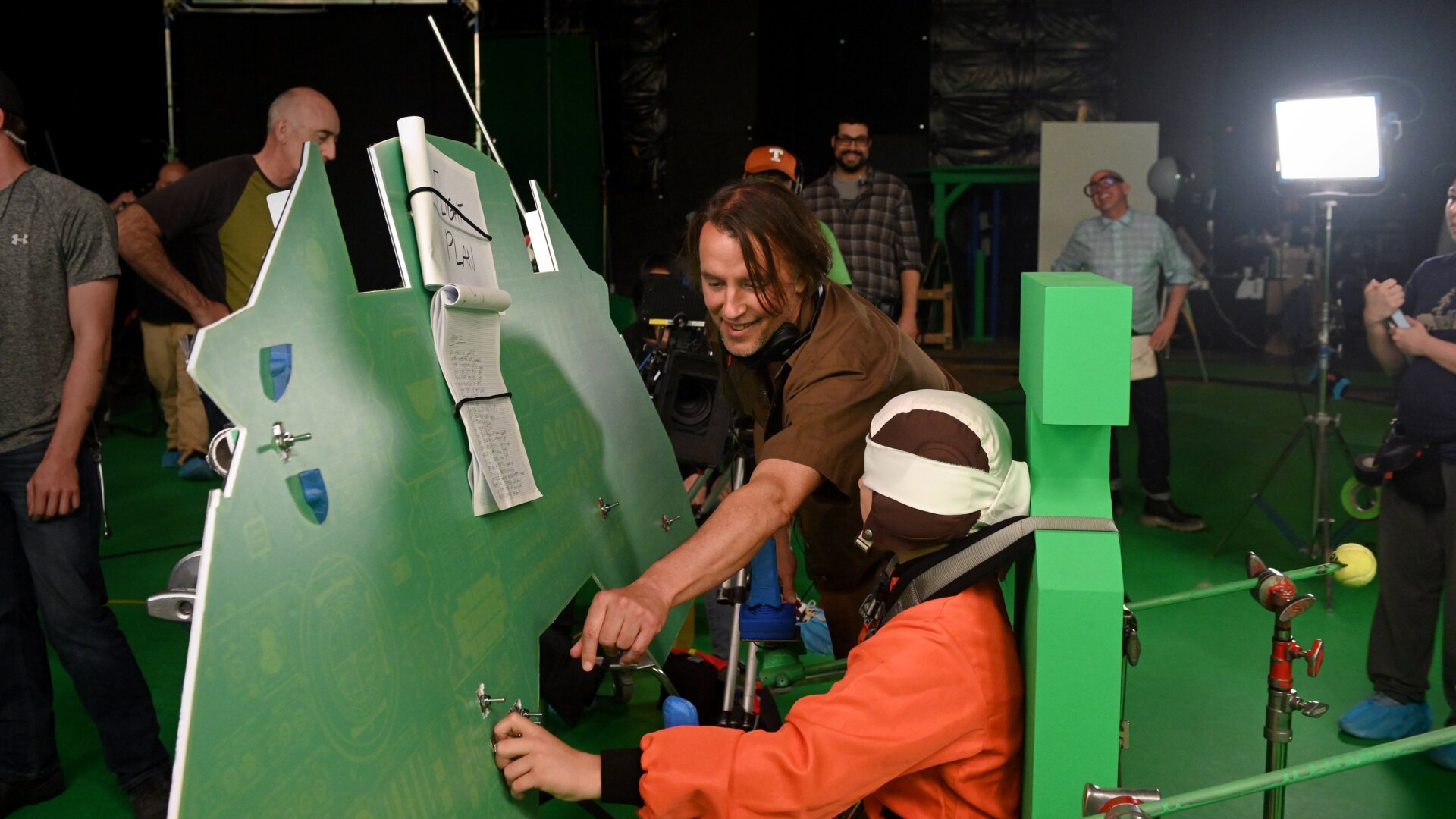 Richard Linklater directing his new movie, Apollo 10 1/2, with actor Milo Coy.