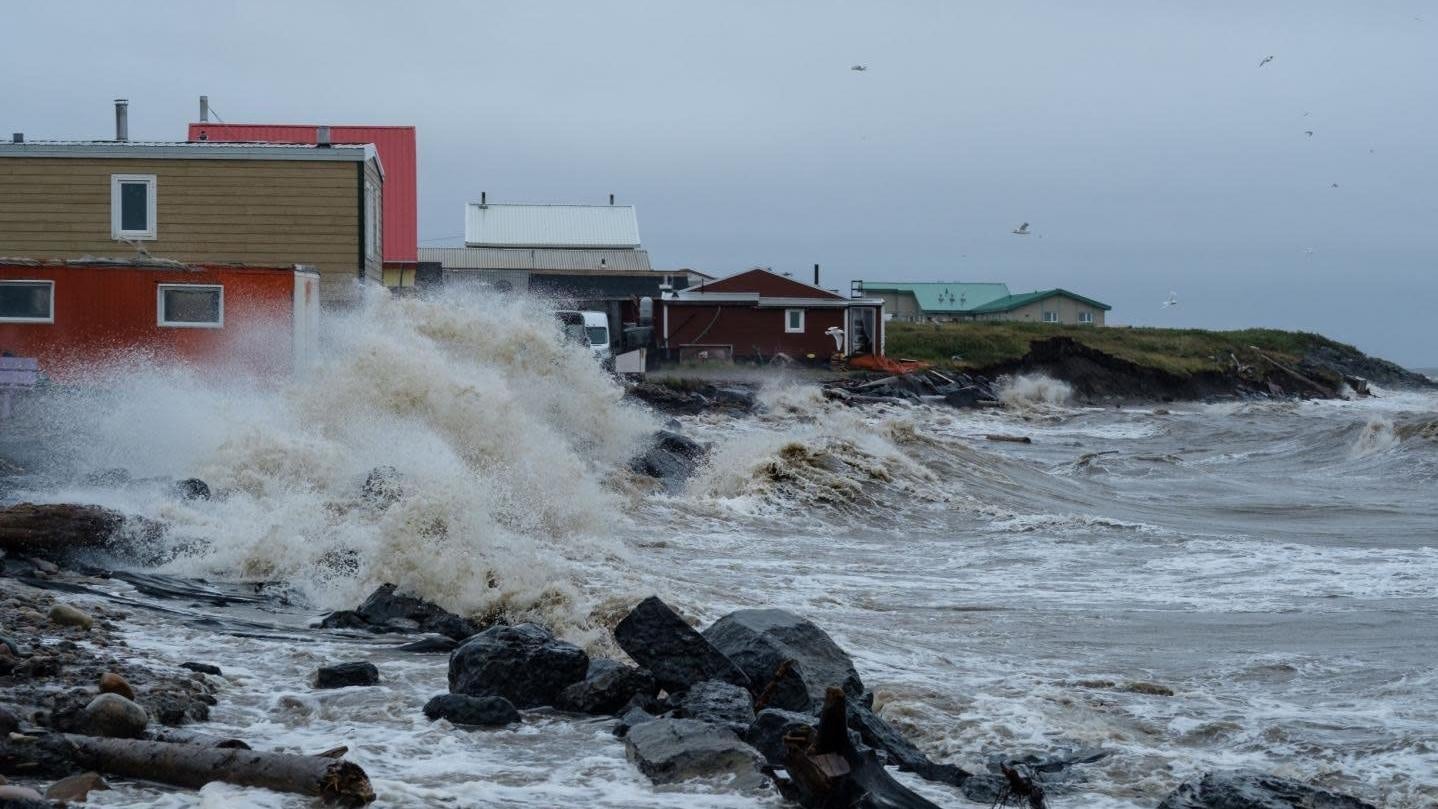 A wave washing up on the Inuvialuit hamlet of Tuktoyaktuk in Canada’s Northwest Territories during an August 2019 storm.