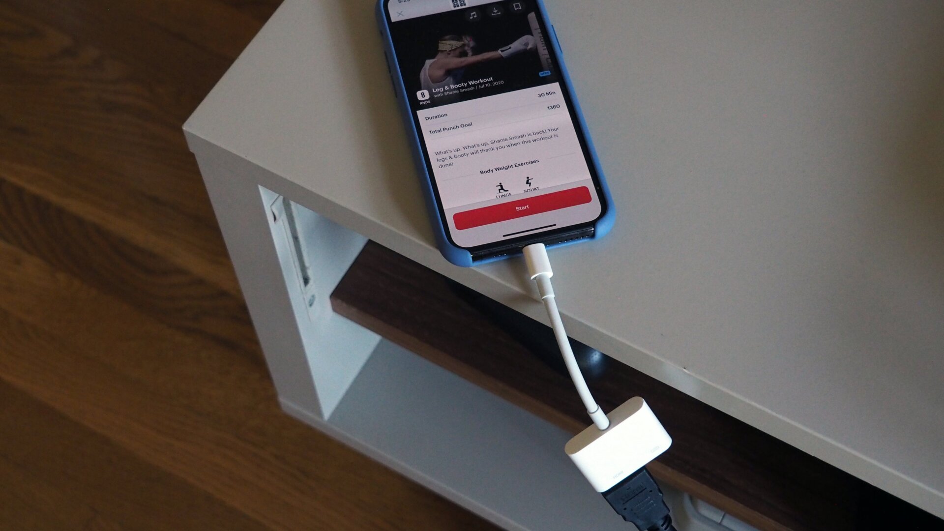 Using a Lightning-to-HDMI dongle is the easiest way to stream FightCamp workouts to a TV.