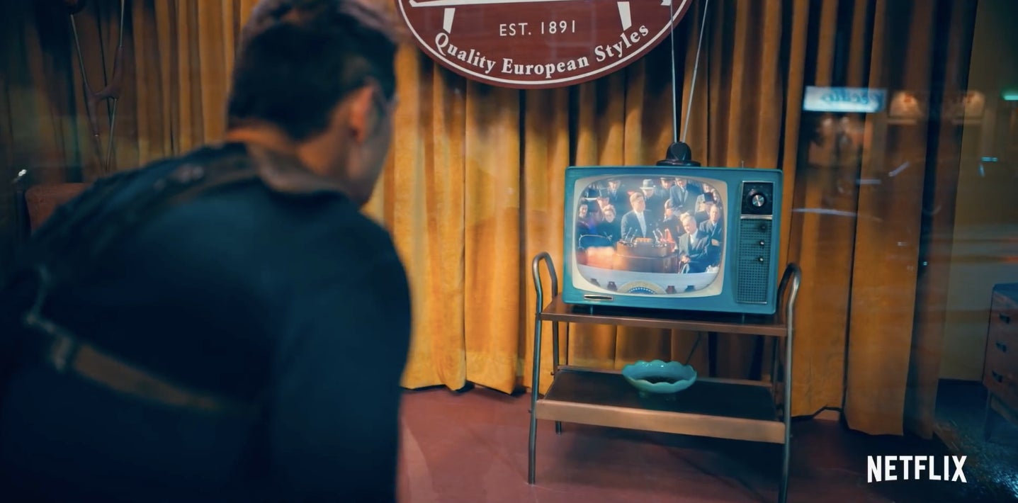 Diego watching a newscast.