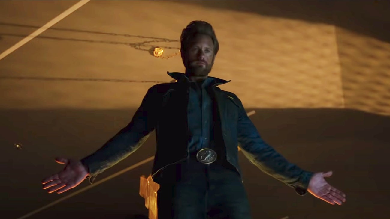 A man in black cometh.