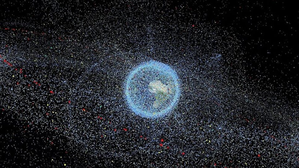 Computer image showing distribution of space debris in orbit around Earth.