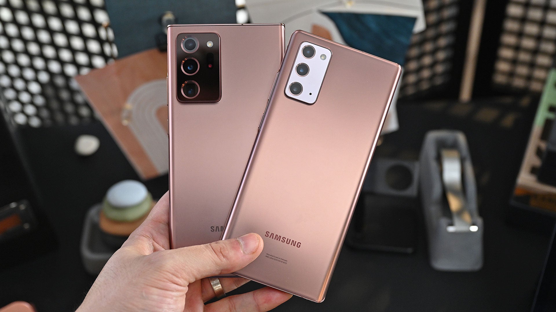 The Note 20 Ultra is on the left, with the regular Note 20 on the right, The easiest way to tell them apart is by looking at their rear cameras, as the standard Note 20 lacks Samsung’s laser autofocus system. 