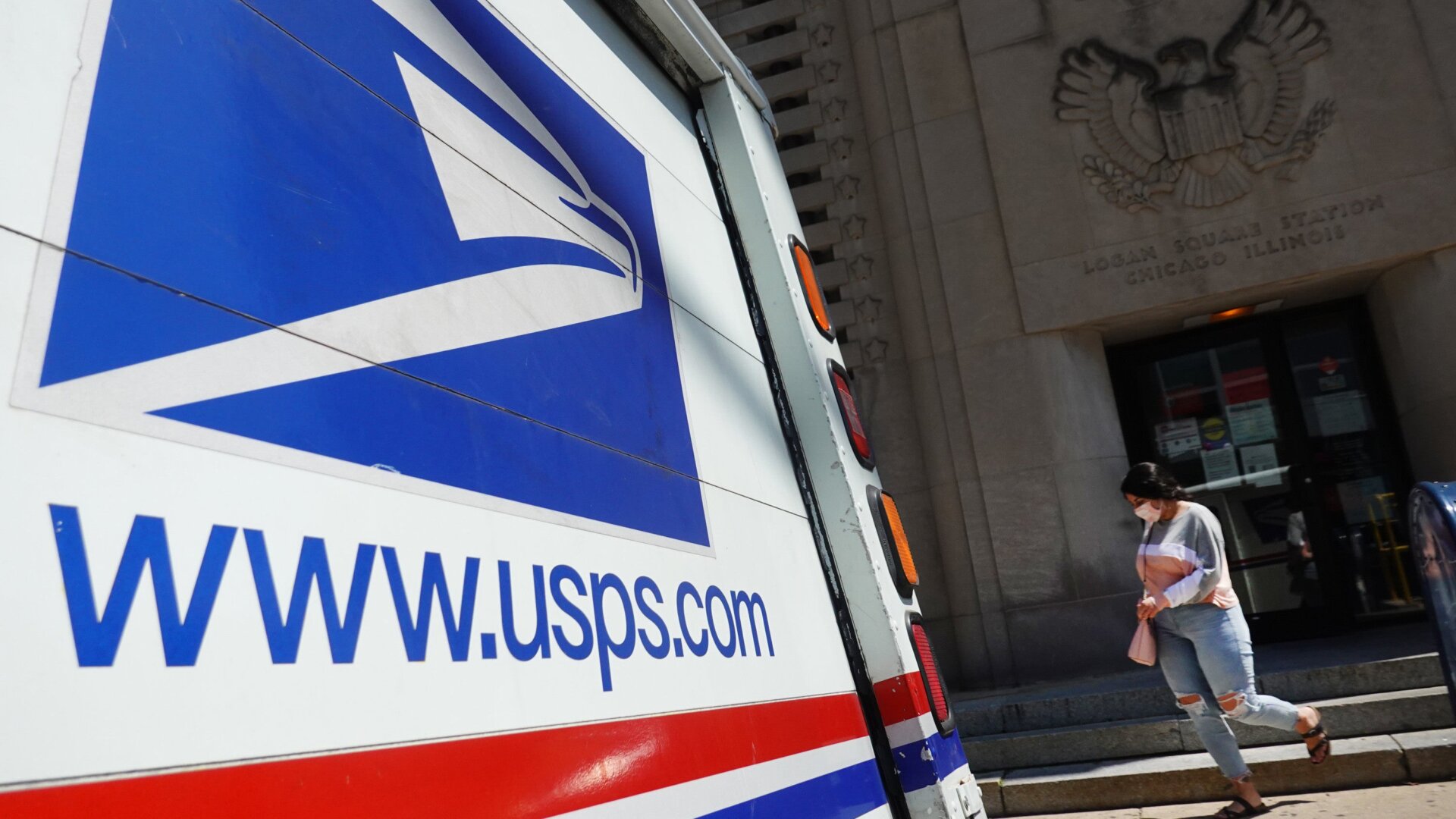 A postal vehicles sits in front of a United State Postal Service facility on Aug. 13 in Chicago, Ill. President Donald Trump said today that he opposes additional funding for the Postal Service because the lack of additional funding would make it more difficult to deliver mail-in ballots.