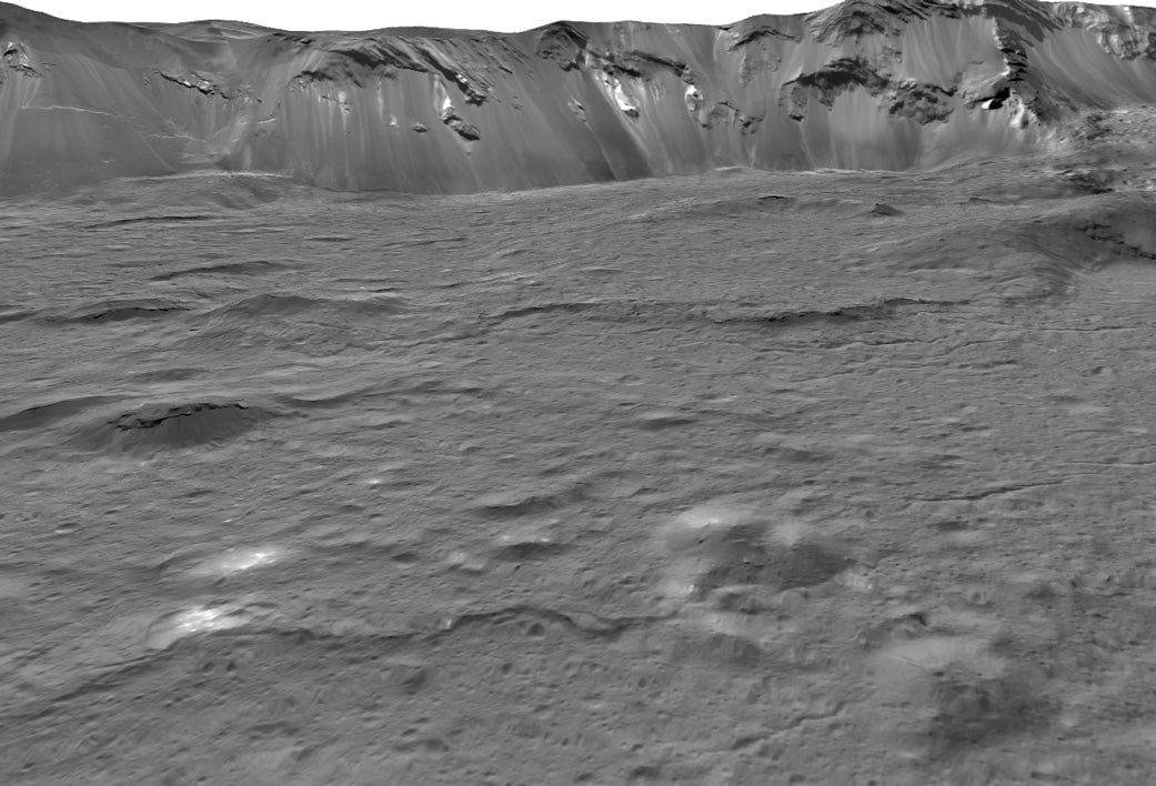 Bright white deposits and domes within Occator Crater, formed from the groundwater below. 