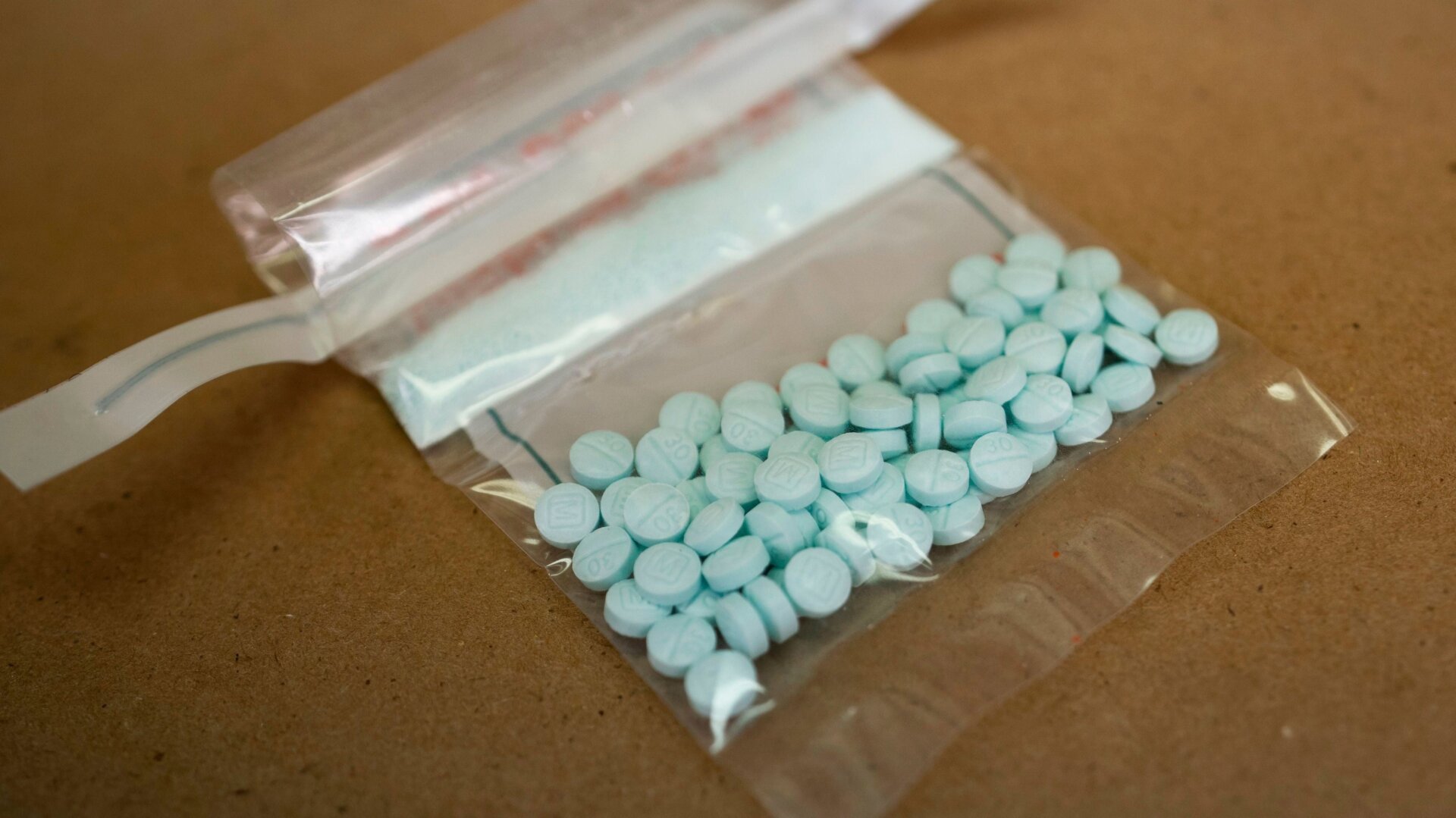 Tablets believed to be laced with fentanyl are displayed at the Drug Enforcement Administration Northeast Regional Laboratory on October 8, 2019 in New York.