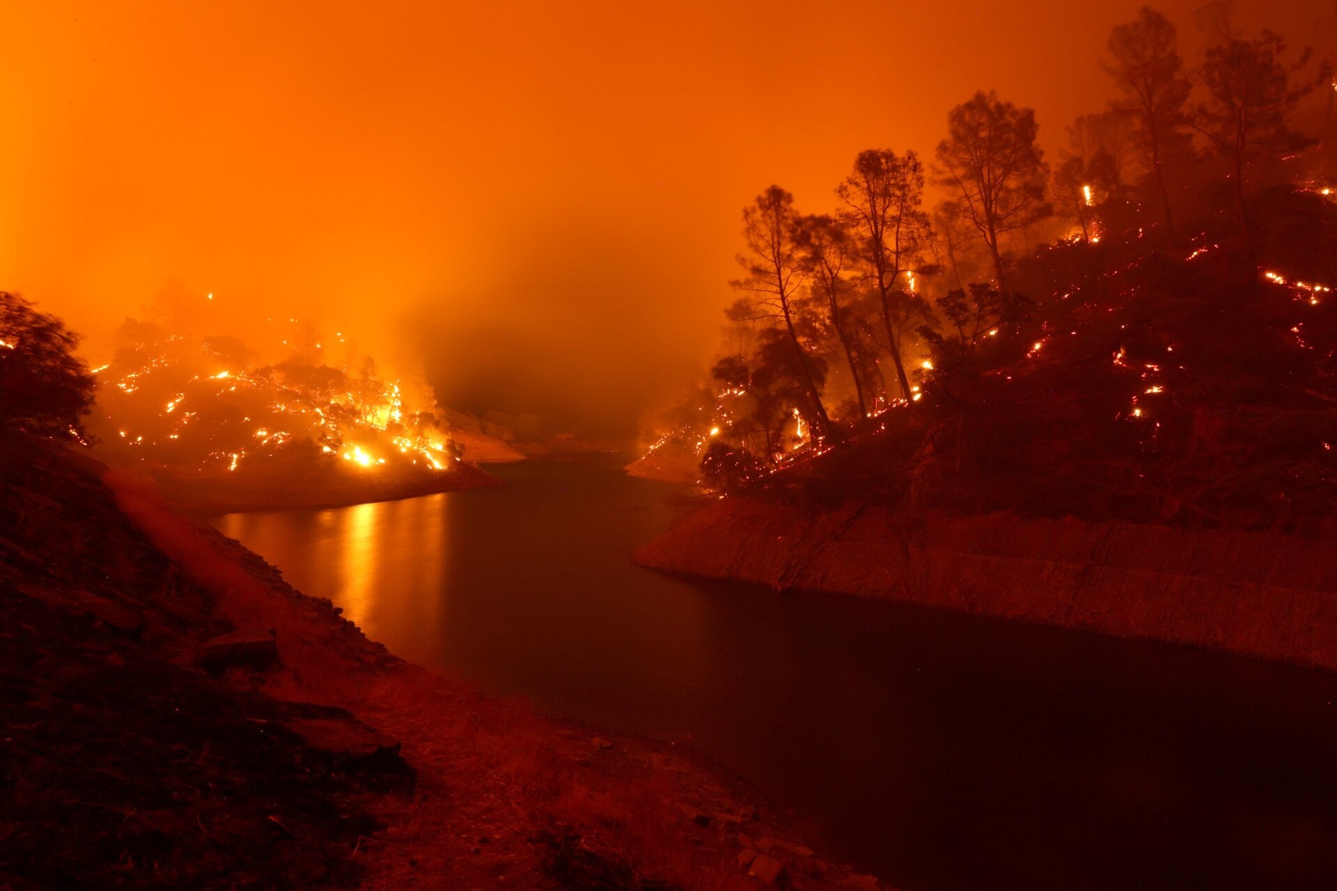 The banks around Lake Berryessa smolder after the LNU Lightning Complex Fire burned through the area on August 18, 2020 in Napa, California. 