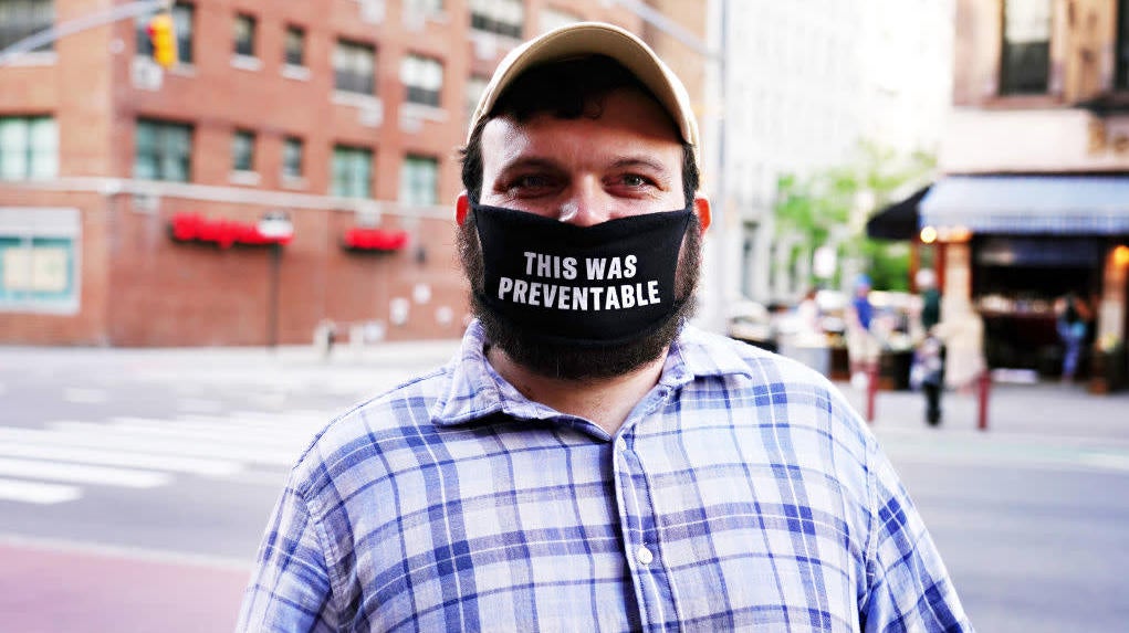 A man wears a protective mask that reads, “THIS WAS PREVENTABLE” during the coronavirus pandemic on May 16, 2020, in New York City. 