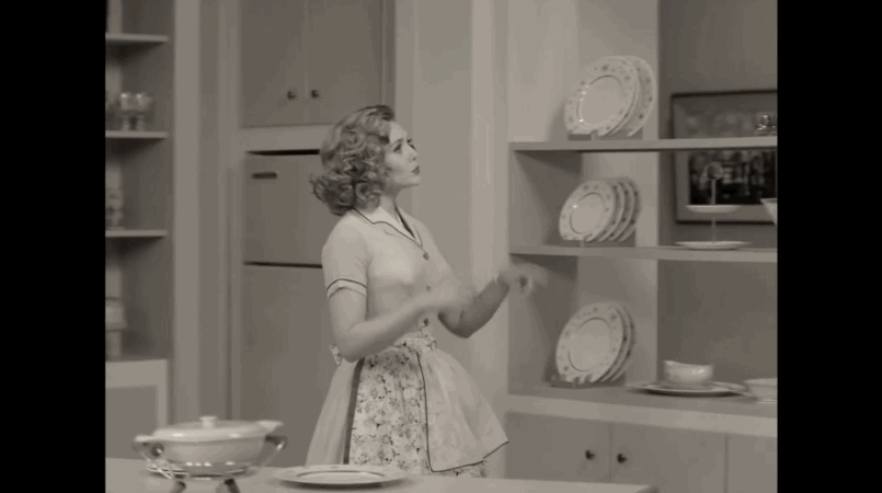 Wanda giving Vision a magical makeover.