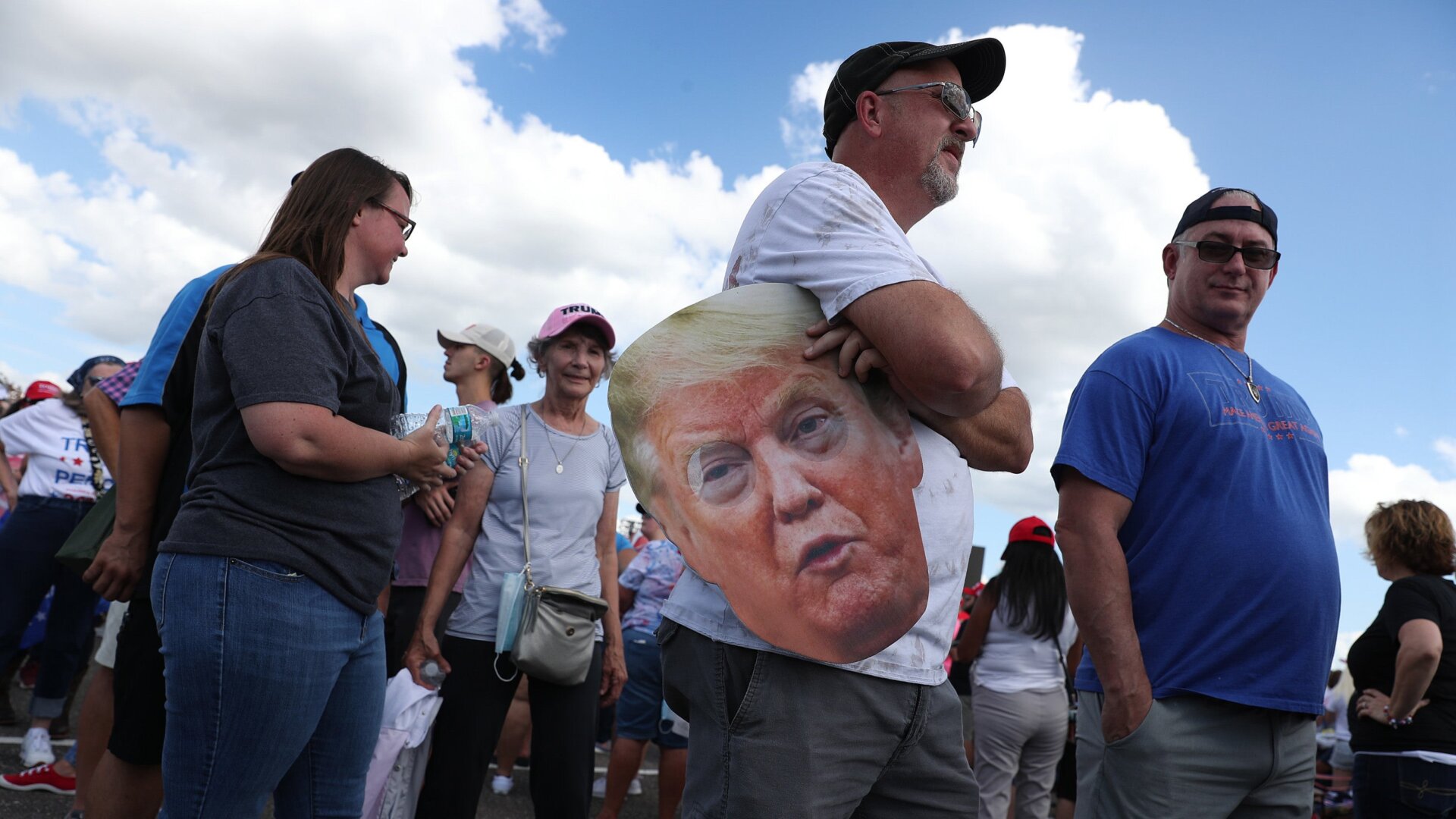 People wait in line for the arrival of President Donald Trump for his, ‘The Great American Comeback Rally’, at Cecil Airport on September 24, 2020 in Jacksonville, Florida.