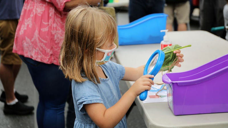 A child participations in an outdoor learning demonstration at Public School 15 in New York City.