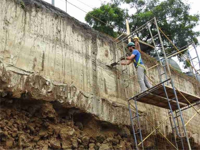 Thick ash deposits being extracted around 6 miles (10 km) from the volcano. 