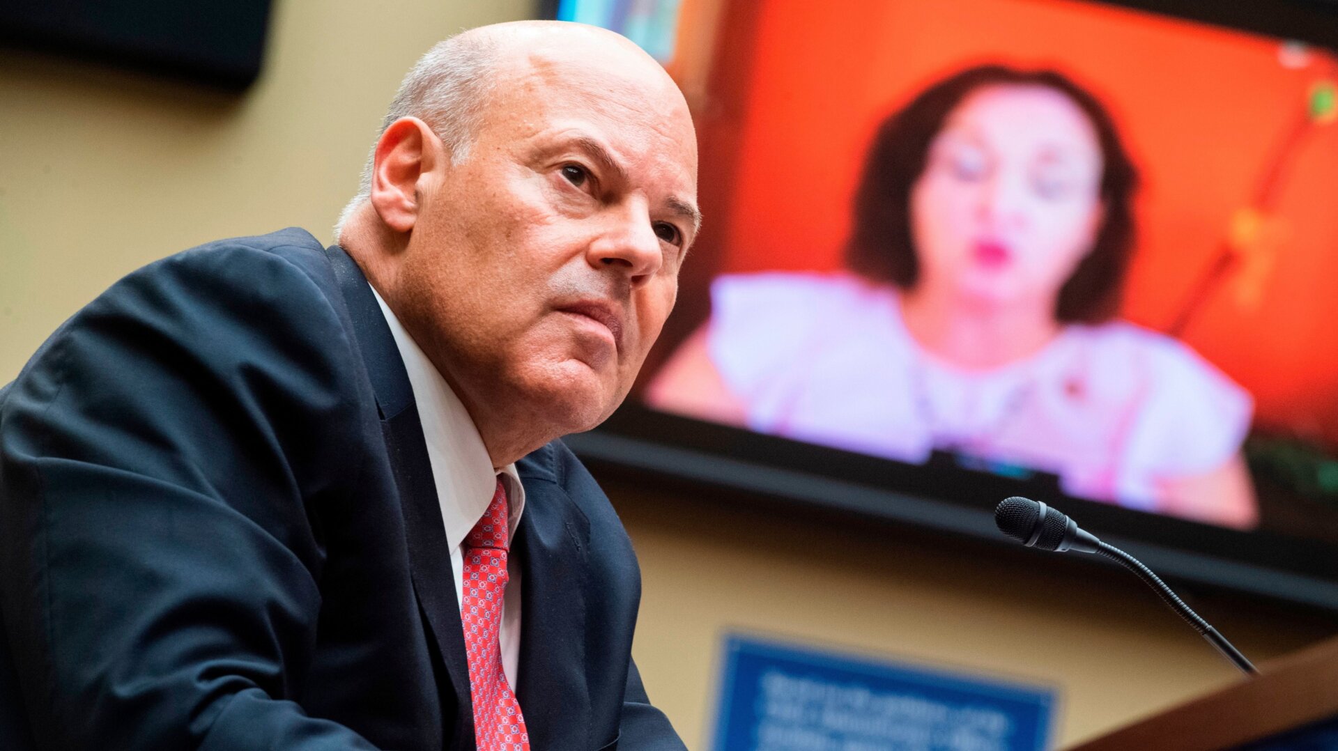 Postmaster General Louis DeJoy testifies during a House Oversight and Reform Committee hearing on Capitol Hill, August 24, 2020.