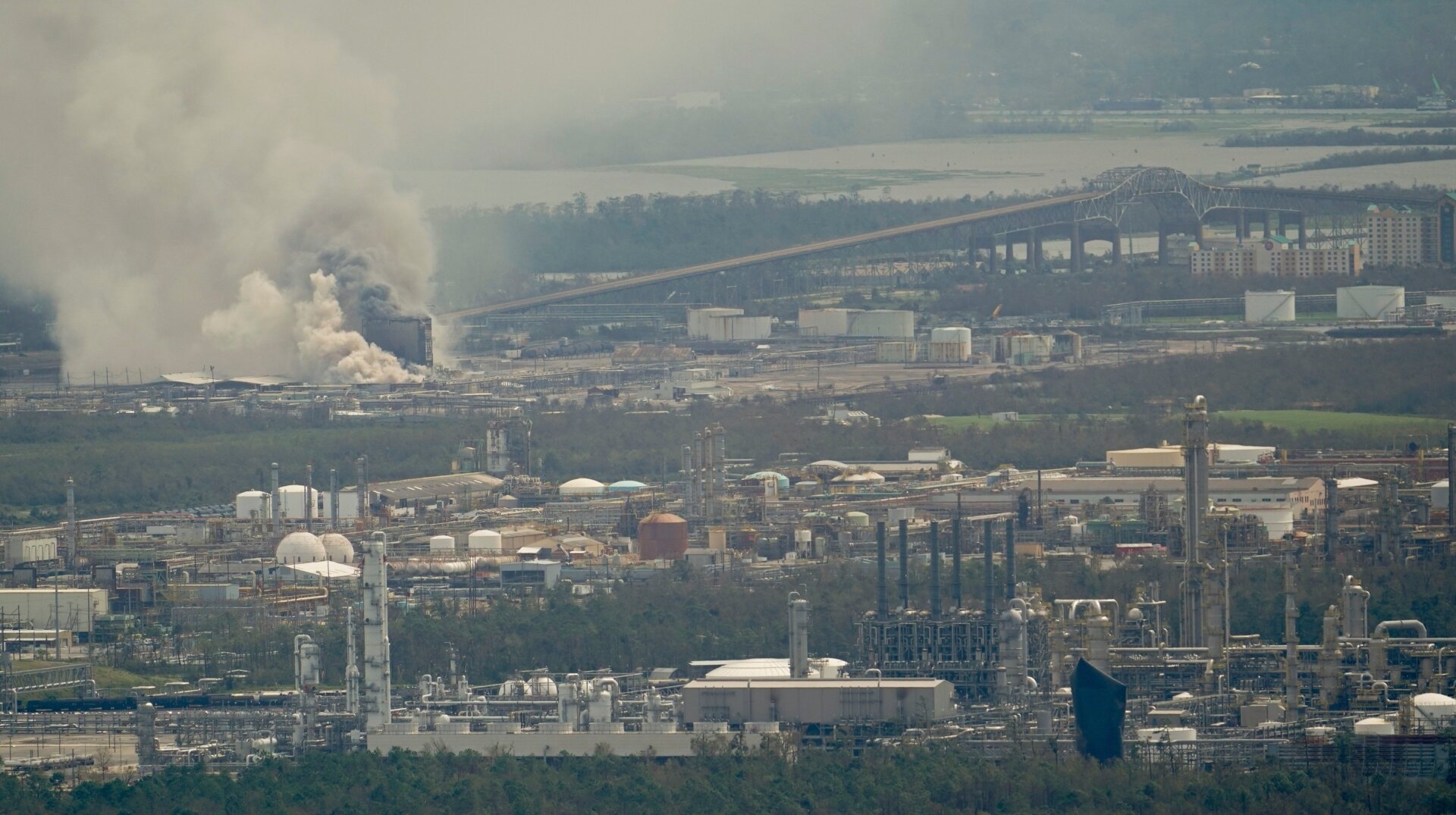A chemical fire burns at a Biolab manufacturing facility during the aftermath of Hurricane Laura Thursday, Aug. 27, 2020, near Lake Charles, Louisiana.
