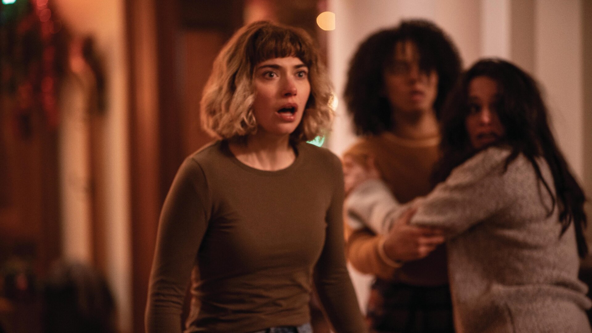 Riley (Imogen Poots), Kris (Aleyse Shannon), and Marty (Lily Donoghue) in Black Christmas.