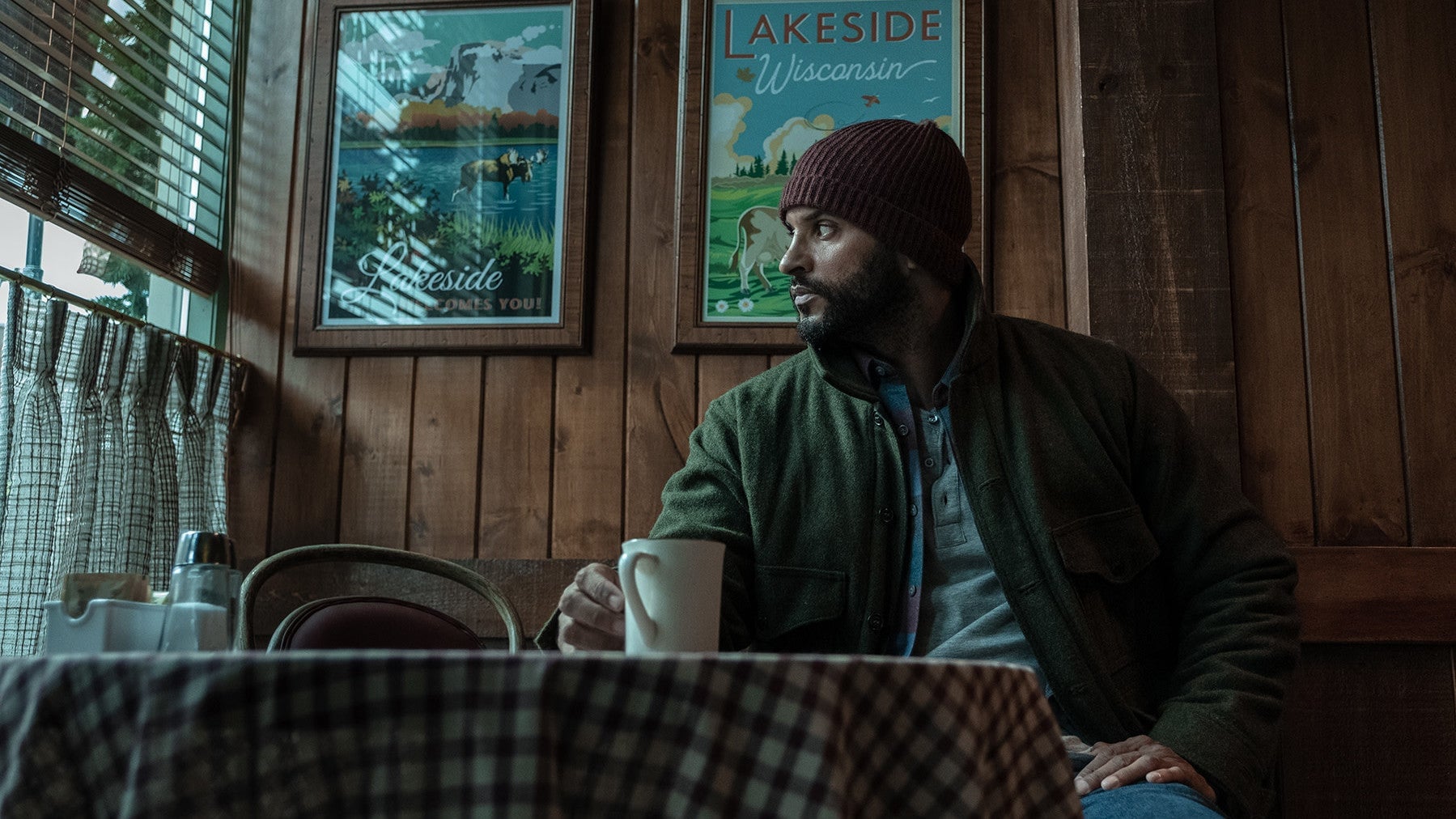 Shadow Moon enjoying a cup of coffee somewhere in the town of Lakeside.