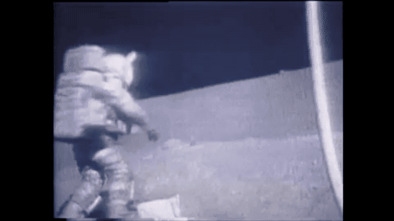 Apollo astronaut Harrison Schmidt falls while trying to grab an object from the surface. 