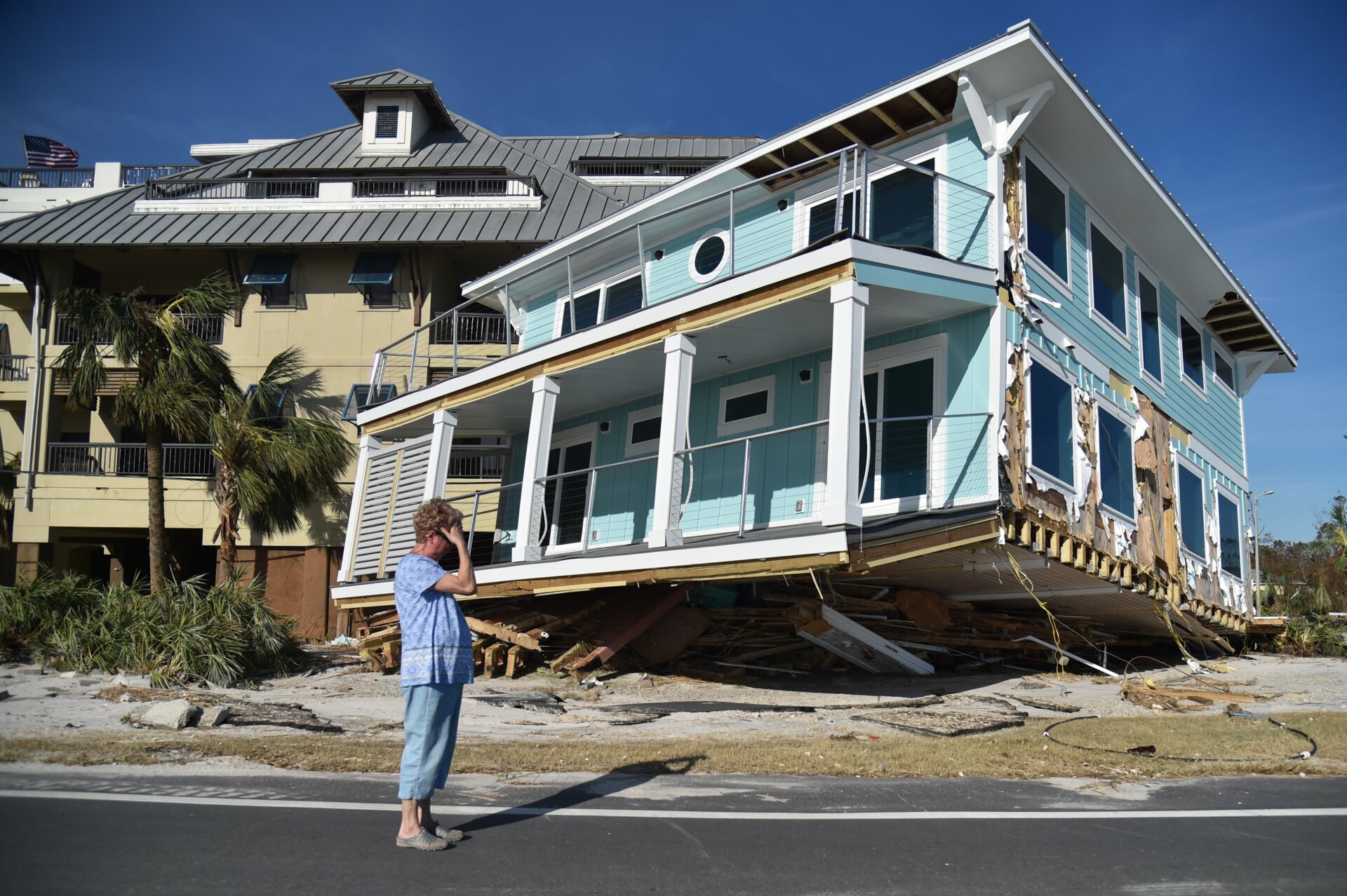 Claire mourns as she sees the damage caused by Hurricane Michael in Mexico Beach, Florida on Oct. 12, 2018.