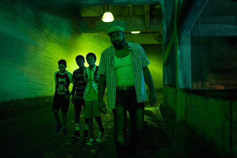 Luis, Bobby, Miguel, and Tony investigating a vampire attack.