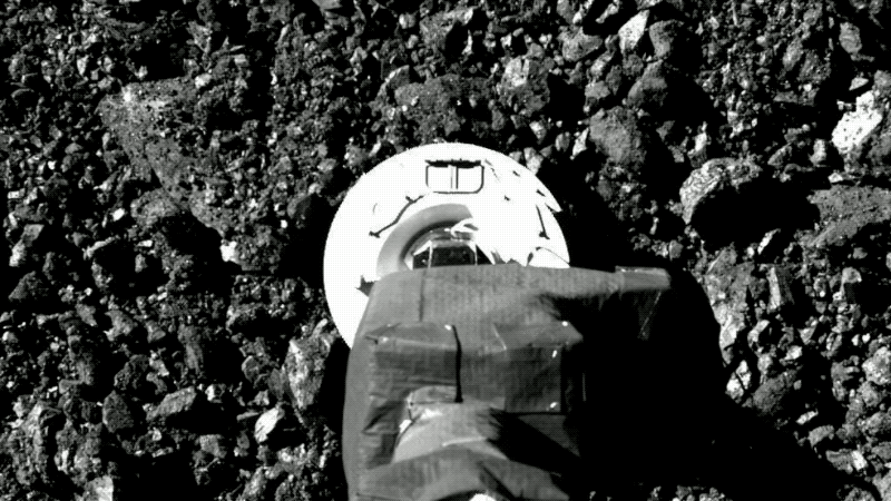 A two-frame GIF showing the sampling head crushing porous rocks on the surface. 