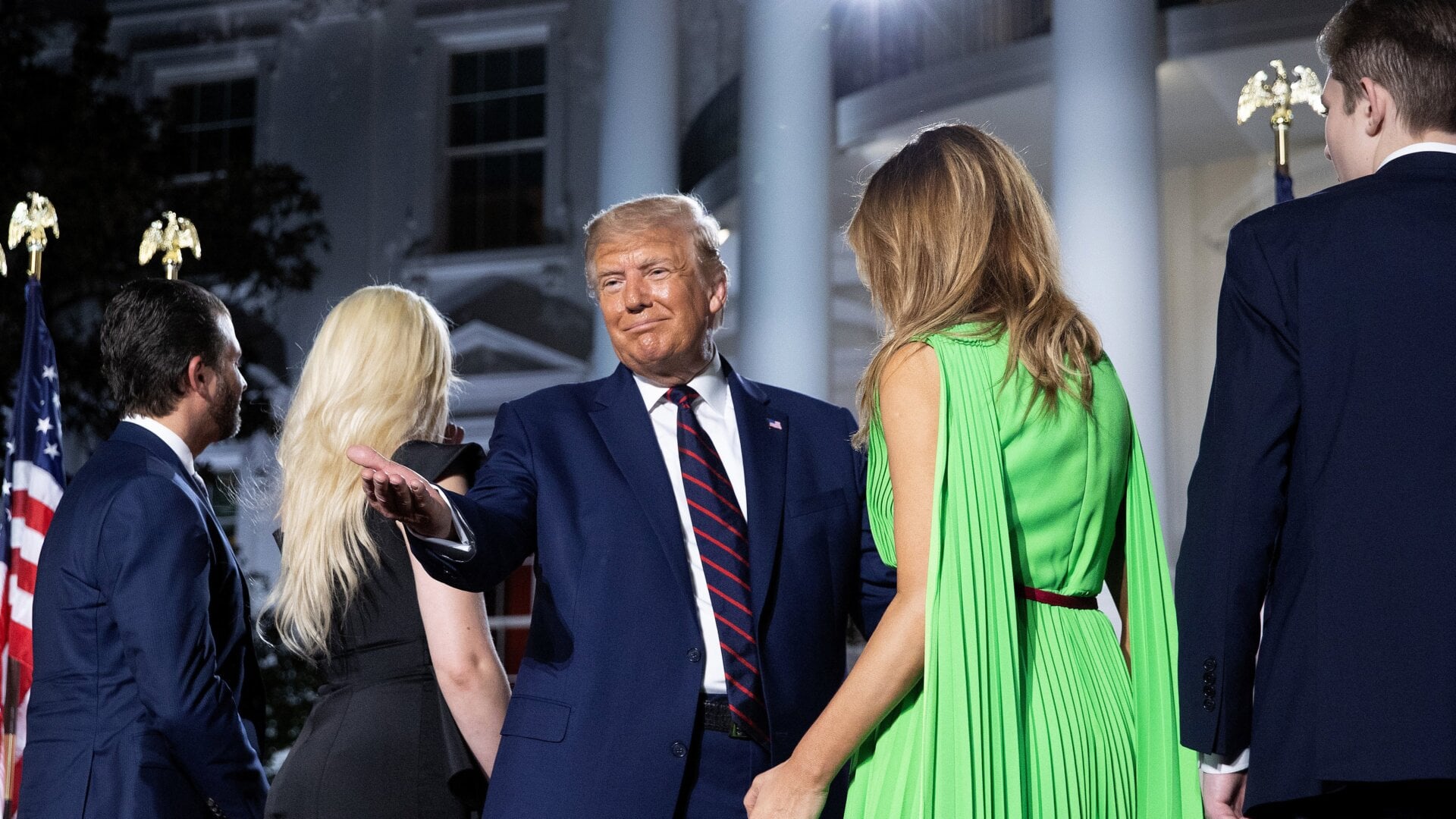 U.S. President Donald Trump stands on stage with his family after delivering his acceptance speech for the Republican presidential nomination on the South Lawn of the White House August 27, 2020.