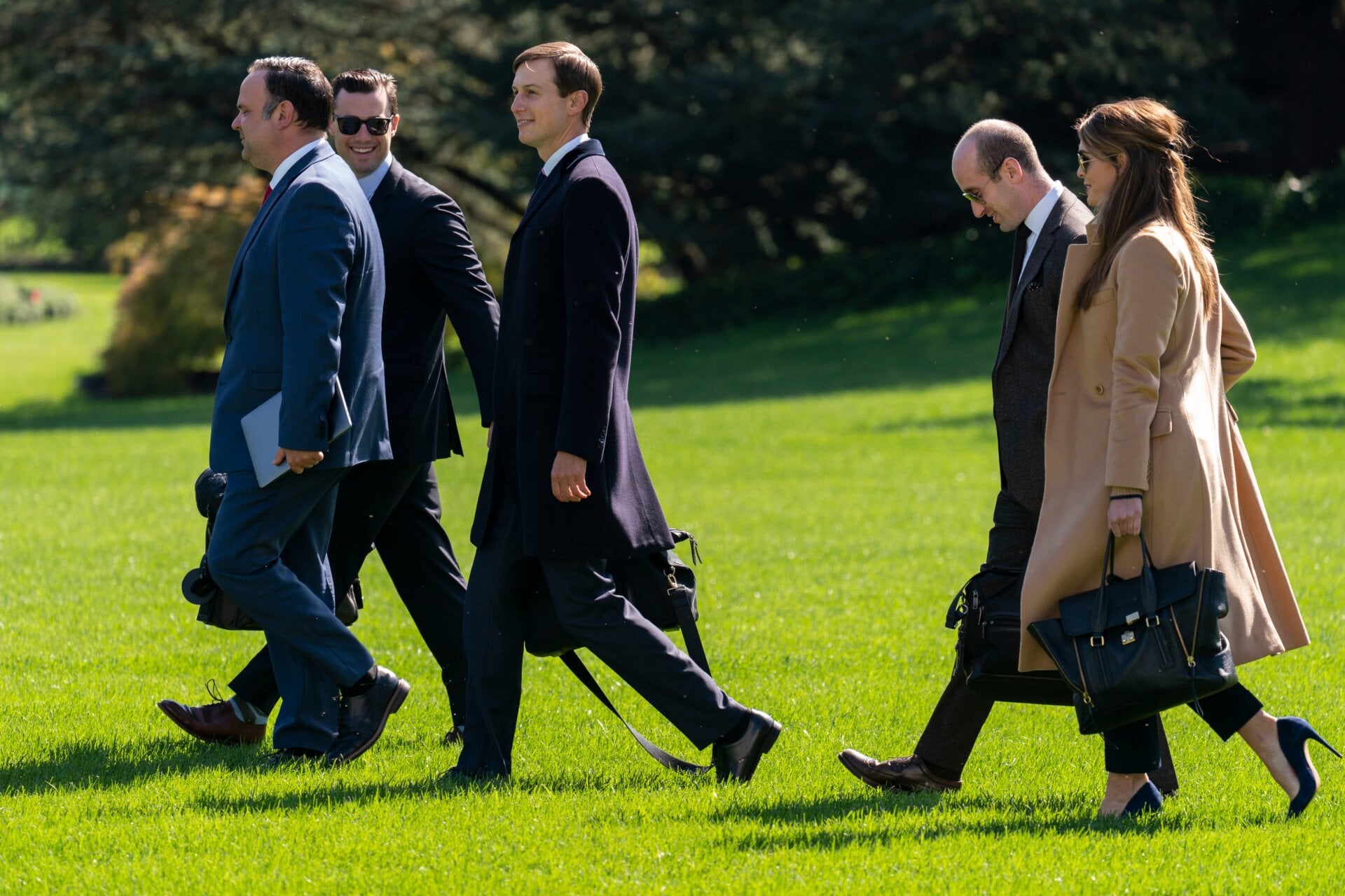 From left,  Dan Scavino, Nicholas Luna, Jared Kushner, Stephen Miller, and Hope Hicks walk to board Marine One with President Donald Trump at the White House, Wednesday, Sept. 30, 2020, in Washington, for the short trip to Andrews Air Force Base en route to Minnesota.