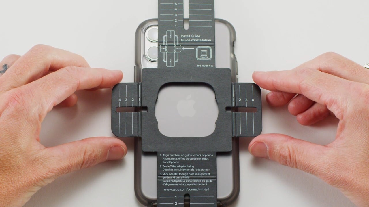 Unlike a PopSocket, you have to be very precise when attaching the Juice Pack Connect’s clip to the back of your device.